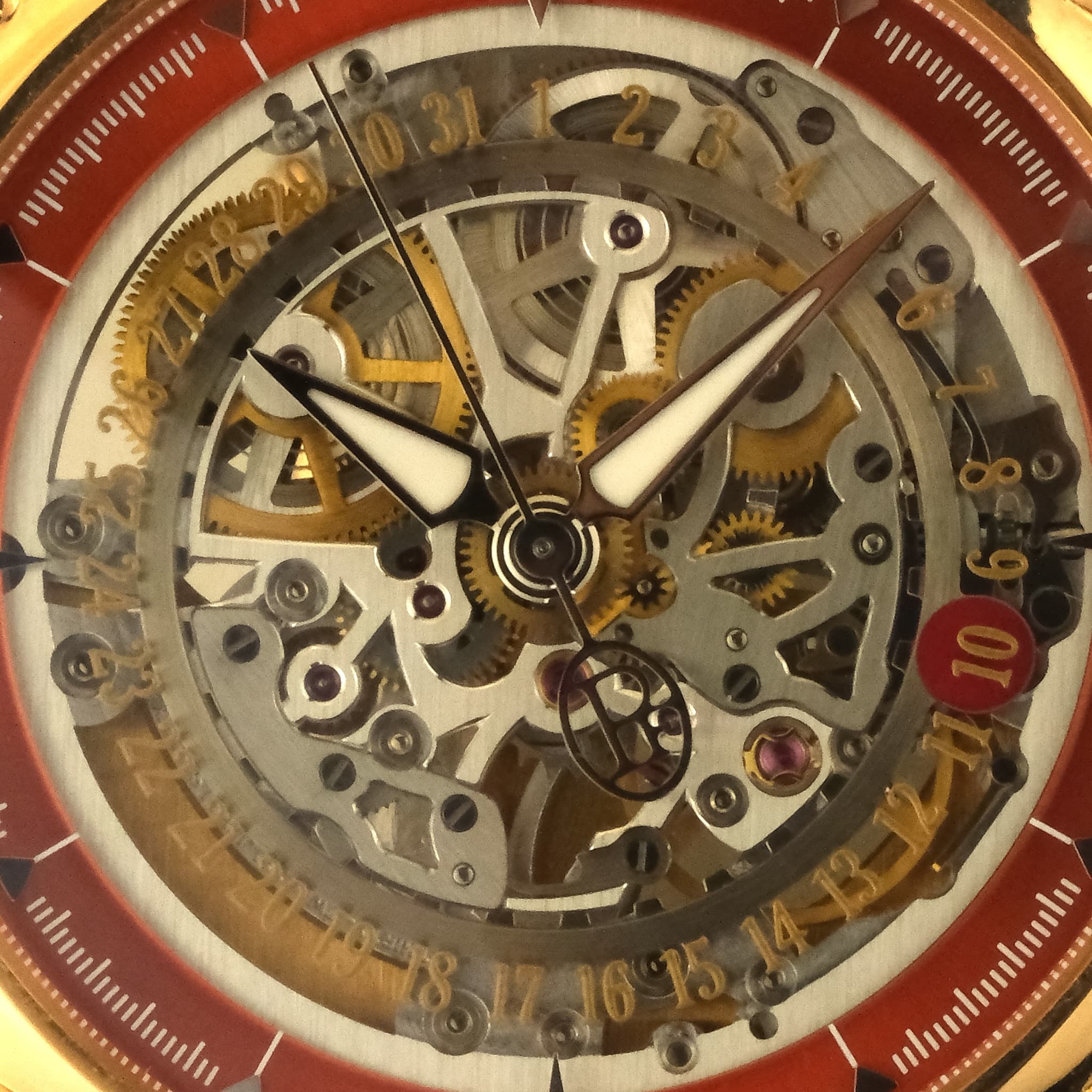 May be an image of wrist watch and text