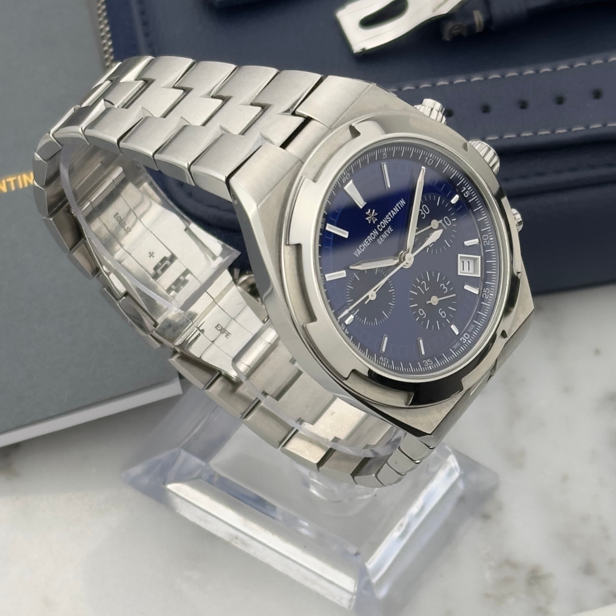May be an image of wrist watch and text