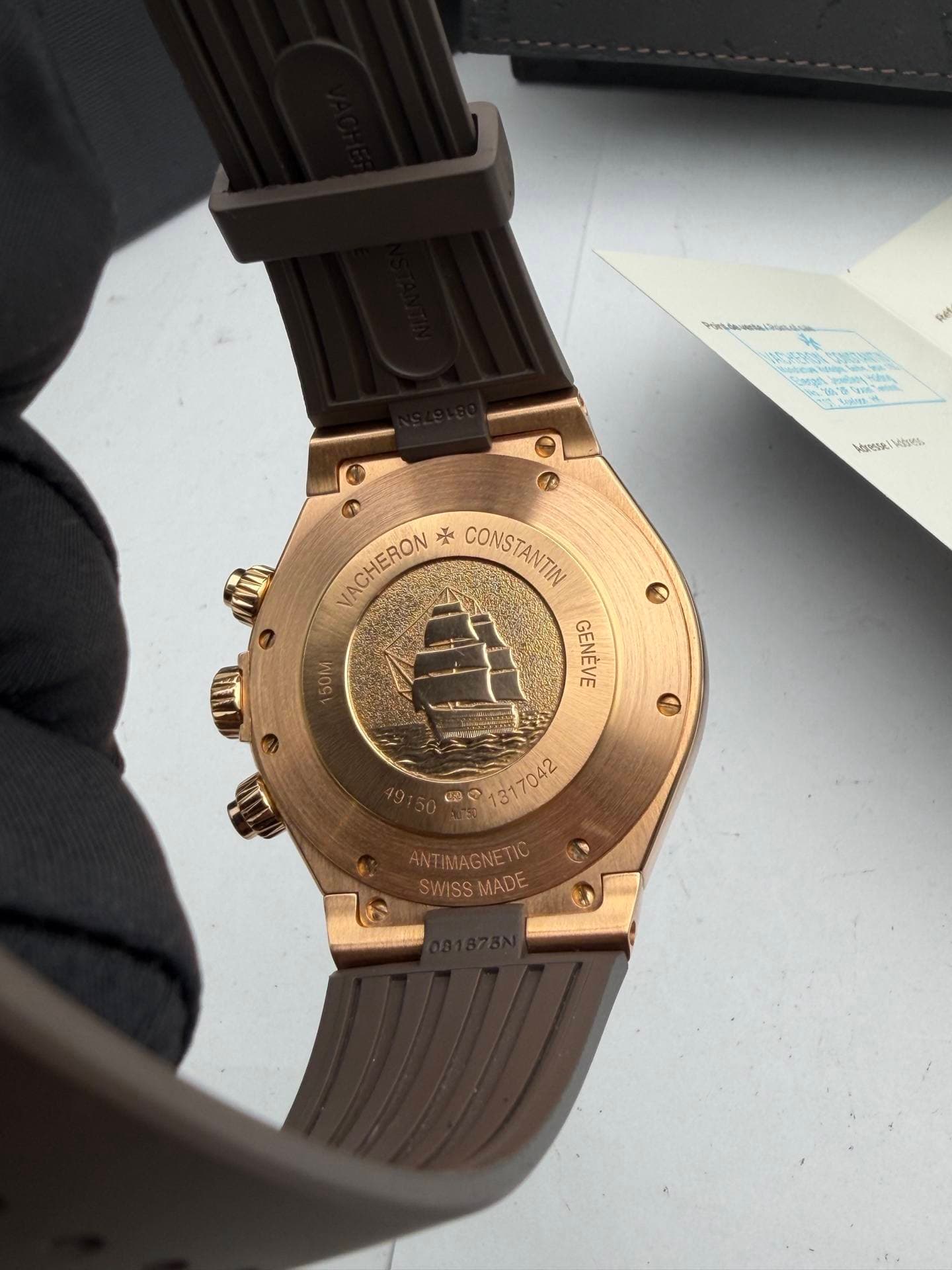 May be an image of wrist watch and text