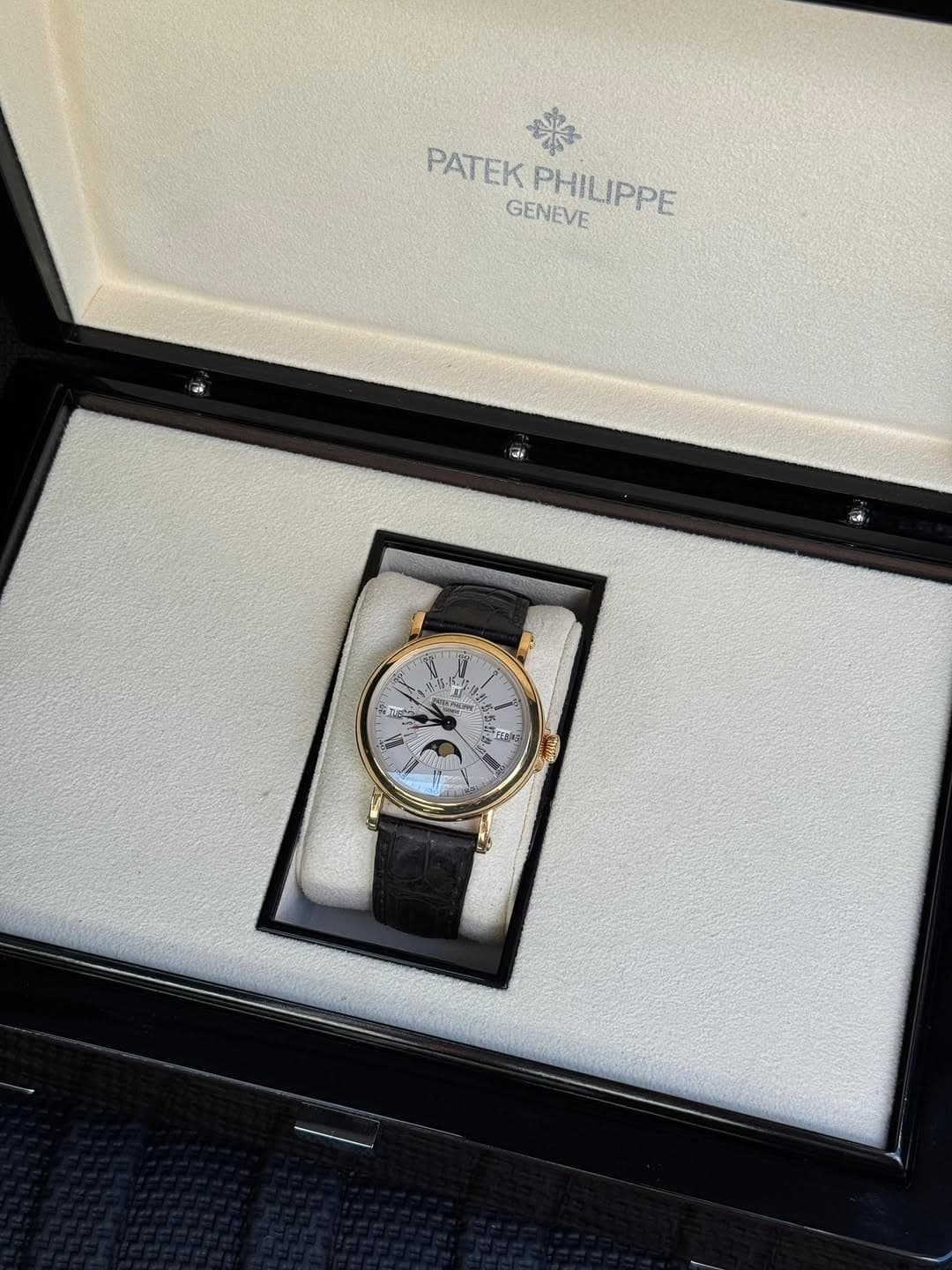 May be an image of wrist watch and text