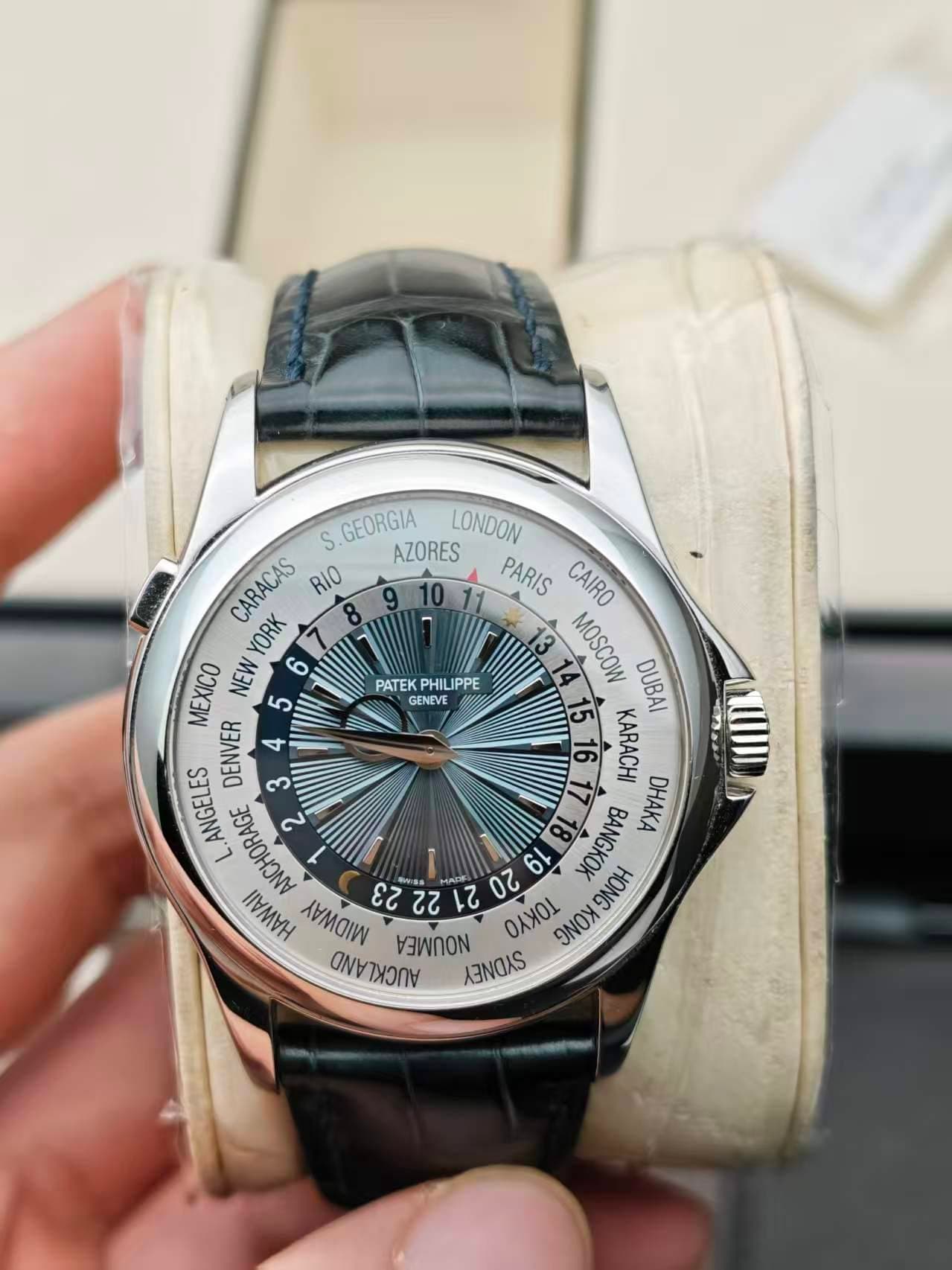 May be an image of wrist watch and text that says 'PATEK PHILIPPE GENEVE S. GEORGIA LONDON CARACAS RIO AZORES PARIS CAIRO YORK 8 MOSCOW DUBAI MEXICO NEW 5 6 お DENVER 4 가롱…
