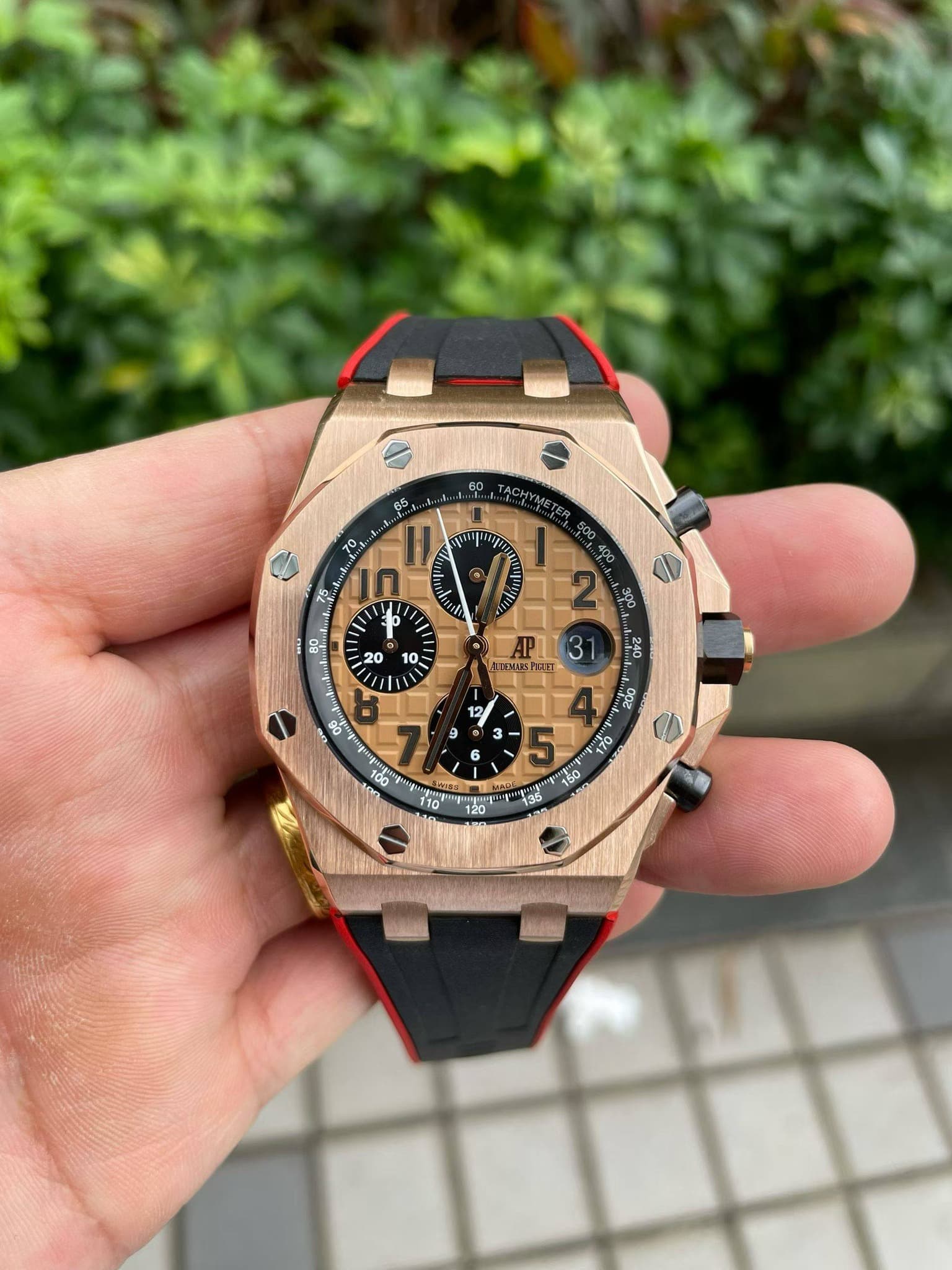 May be an image of wrist watch and text