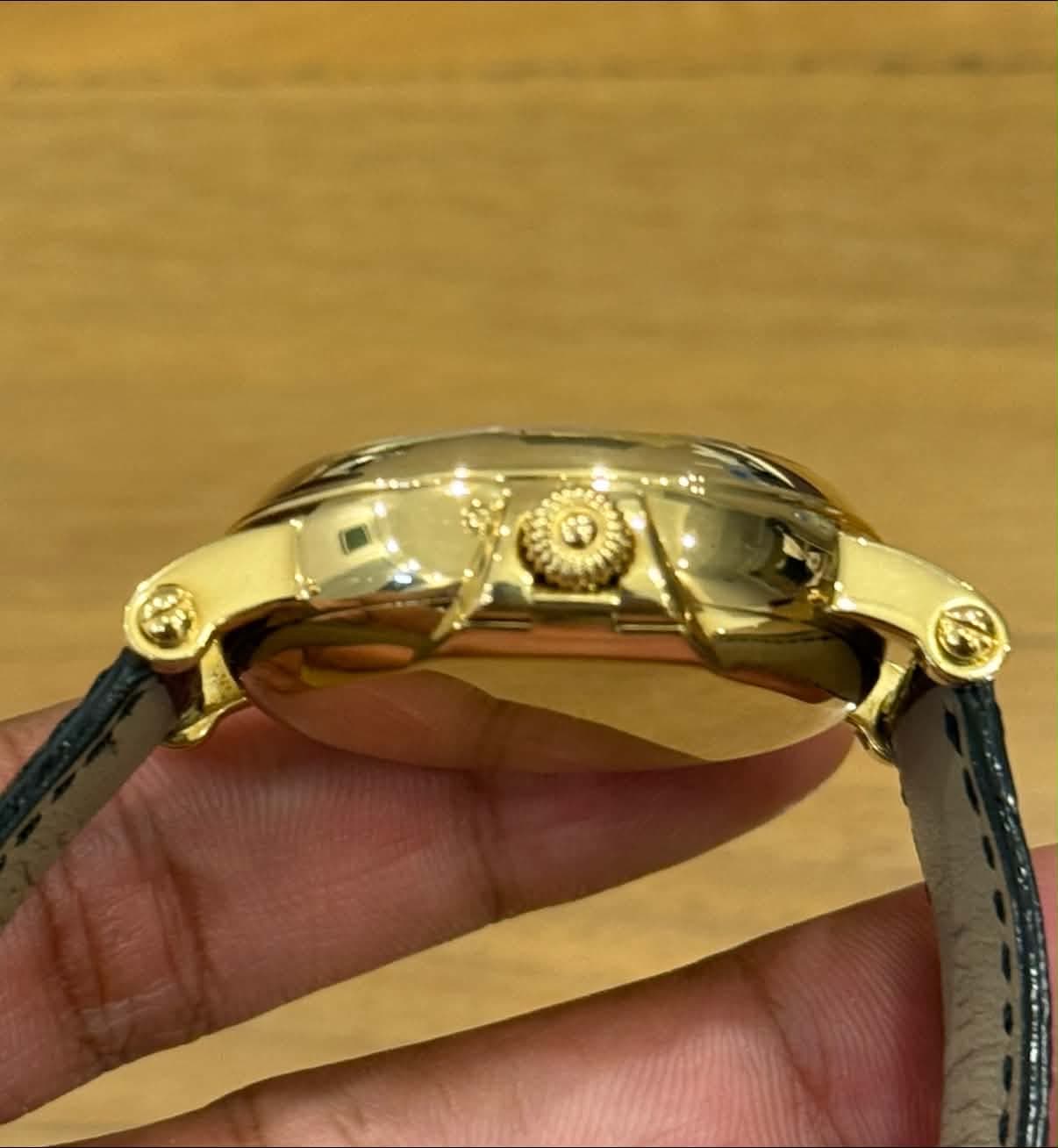 May be an image of wrist watch
