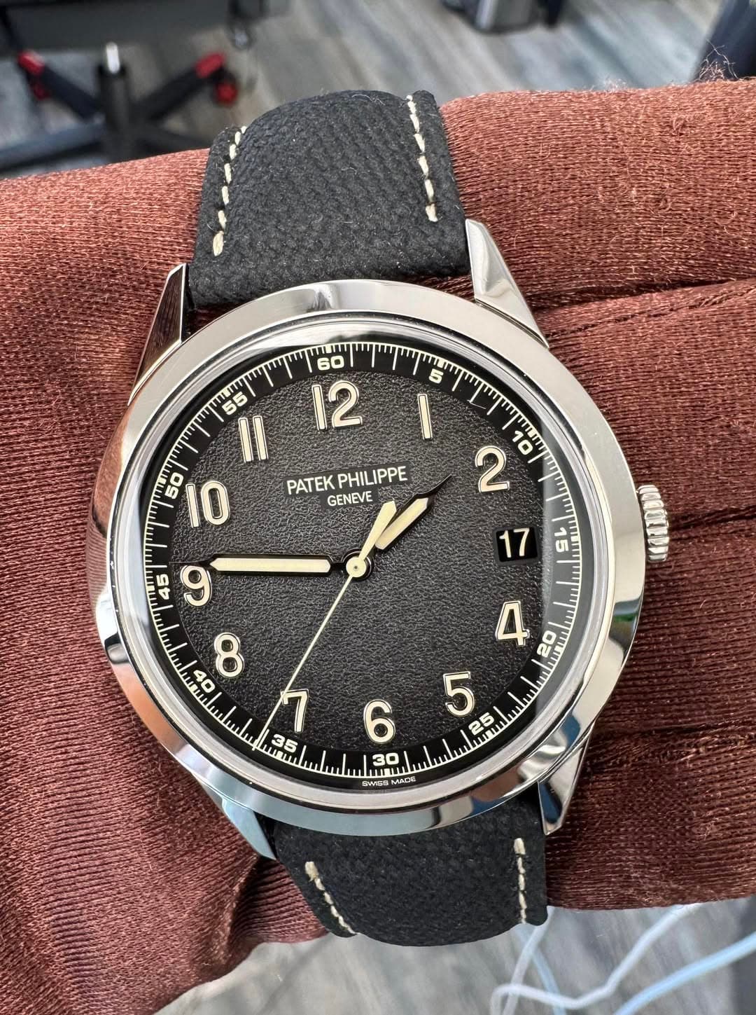 May be an image of wrist watch and text that says '60 12 5 ۱ 55 5 II 50 10 PATEKPHILIPPE PATEK PHILIPPE GENEVE ರా كر ککدم'