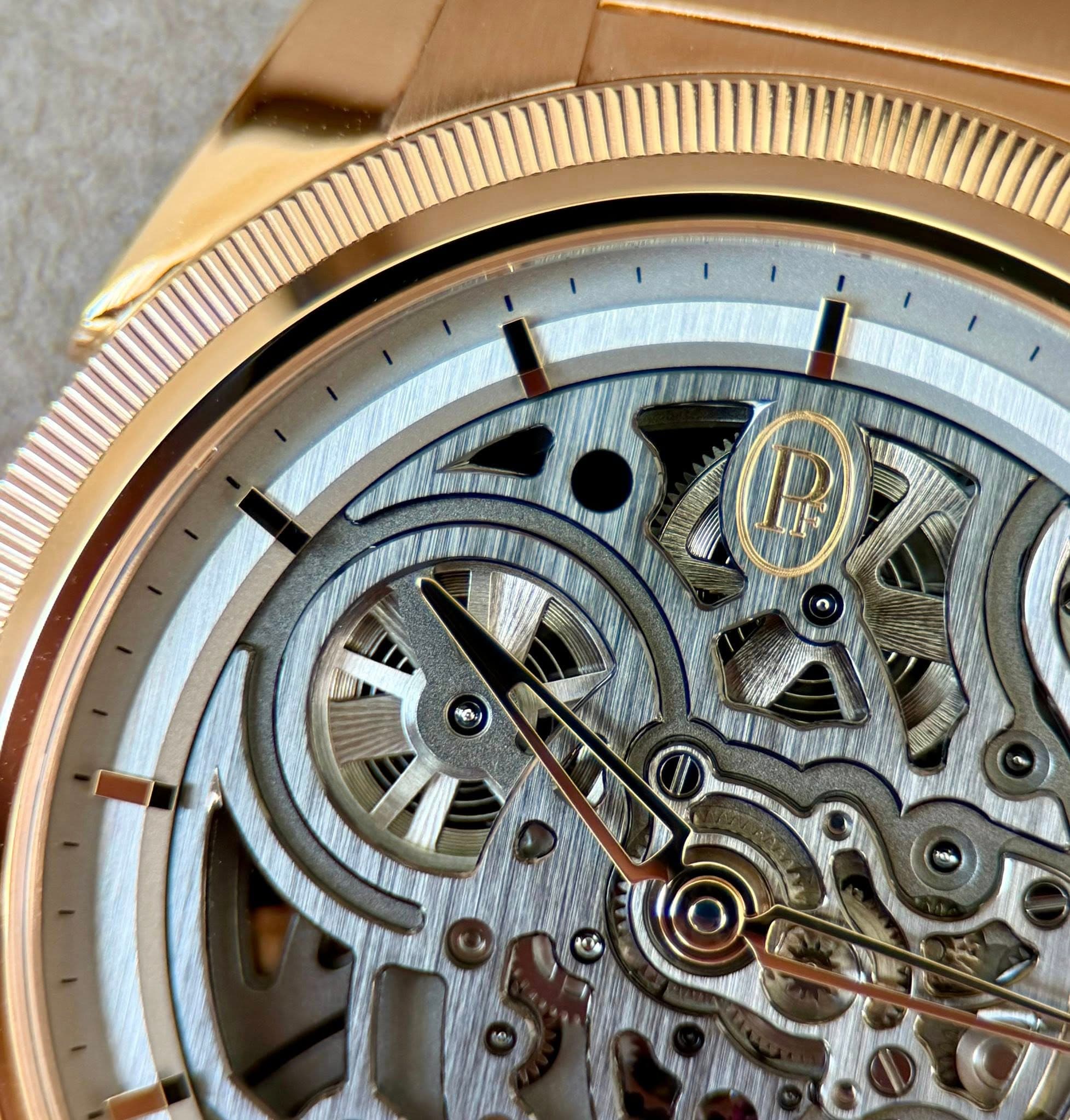May be an image of wrist watch and text