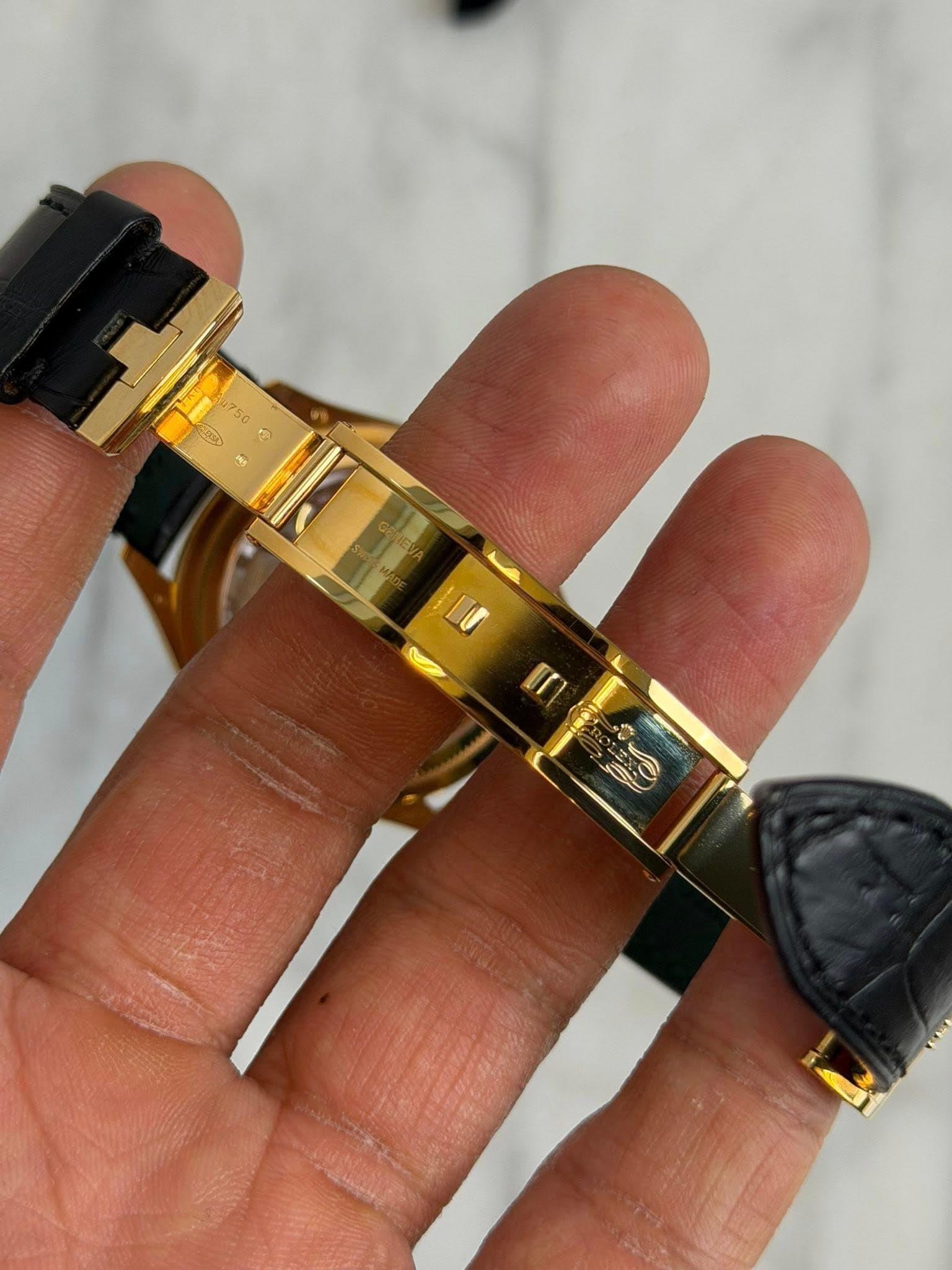 May be an image of wrist watch