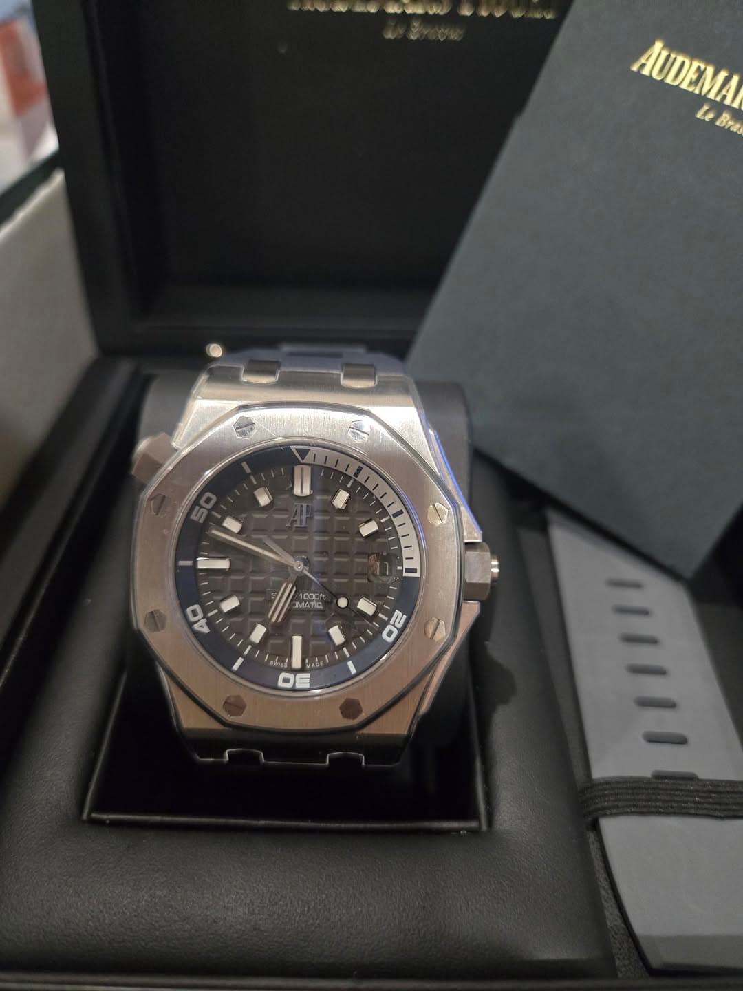 May be an image of wrist watch and text