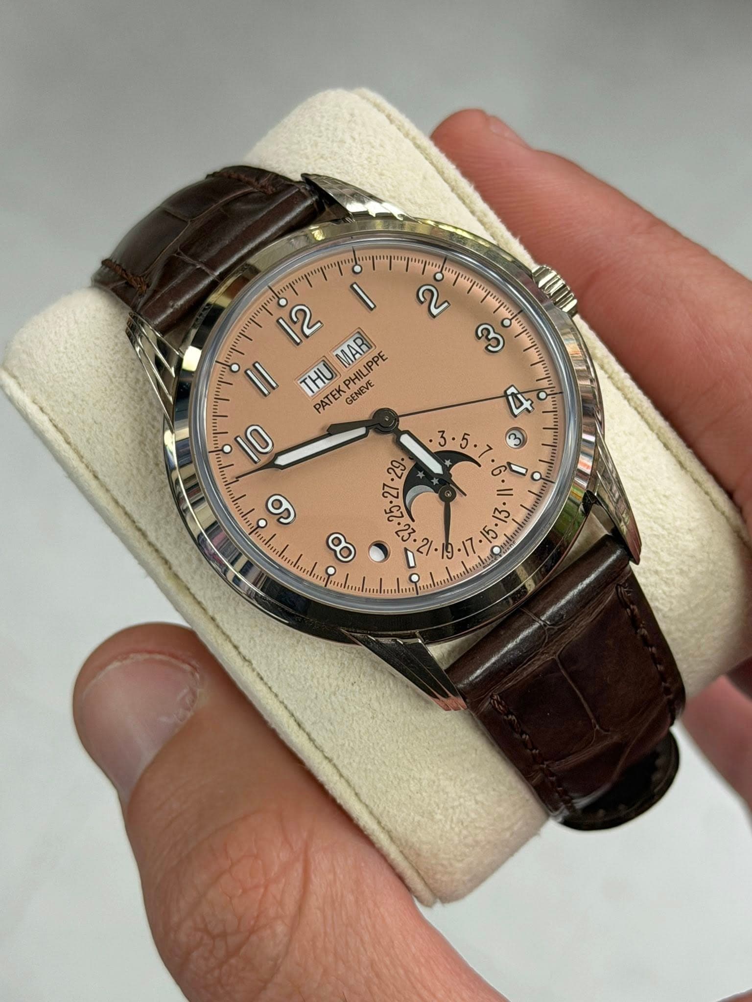 May be an image of wrist watch and text