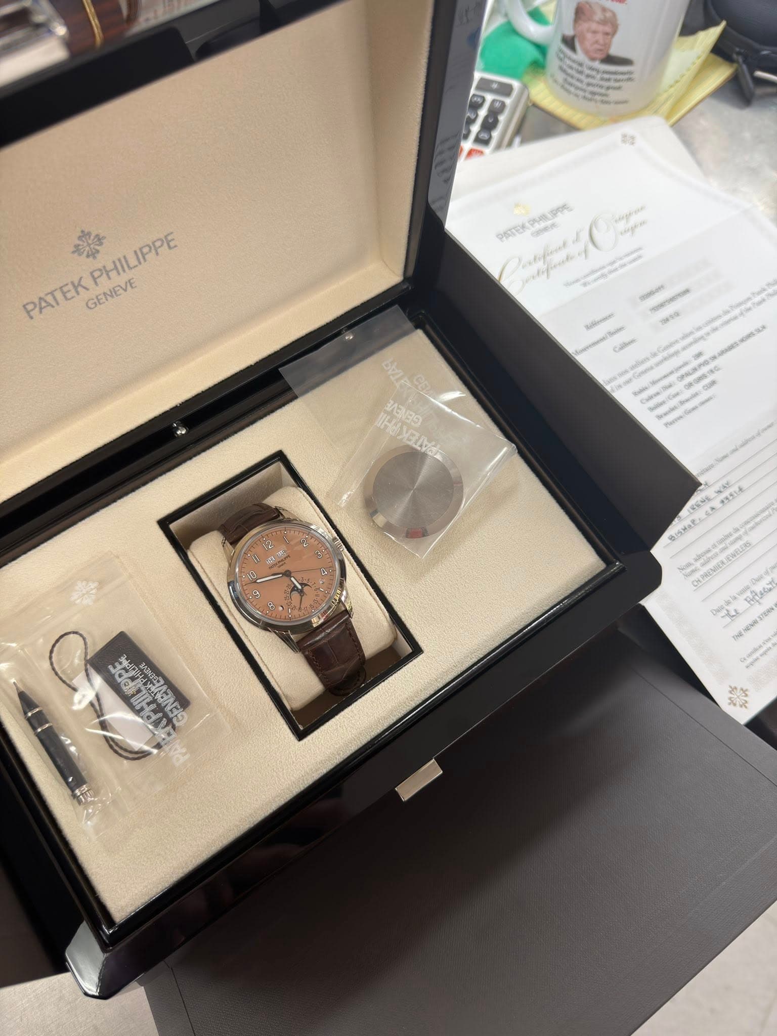 May be an image of wrist watch and text