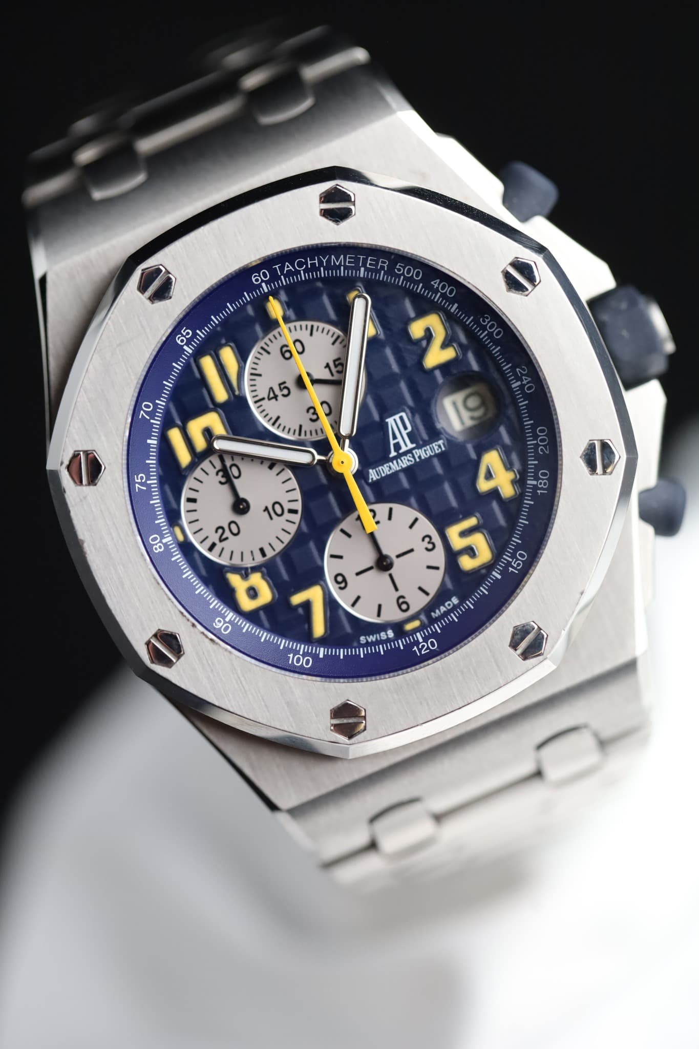 May be an image of wrist watch and text