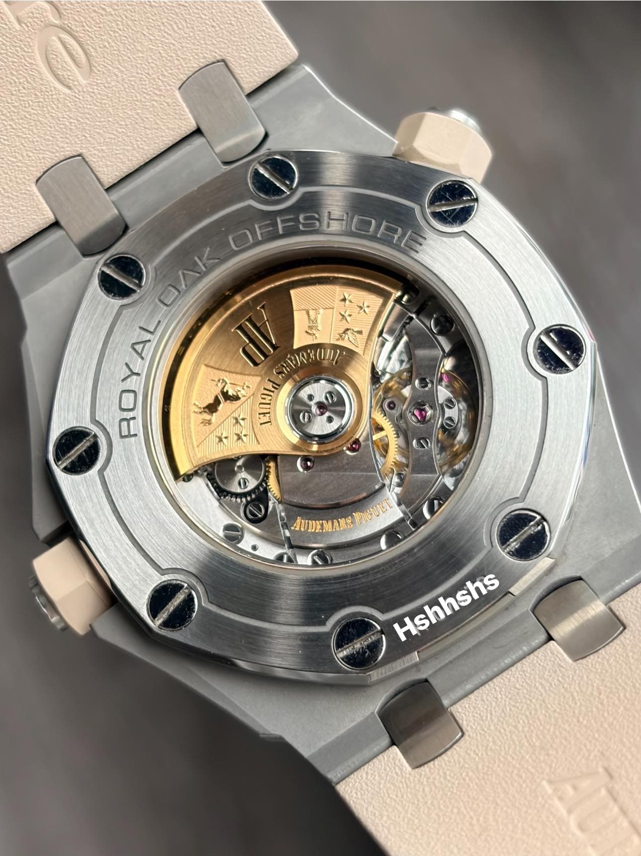May be an image of wrist watch and text