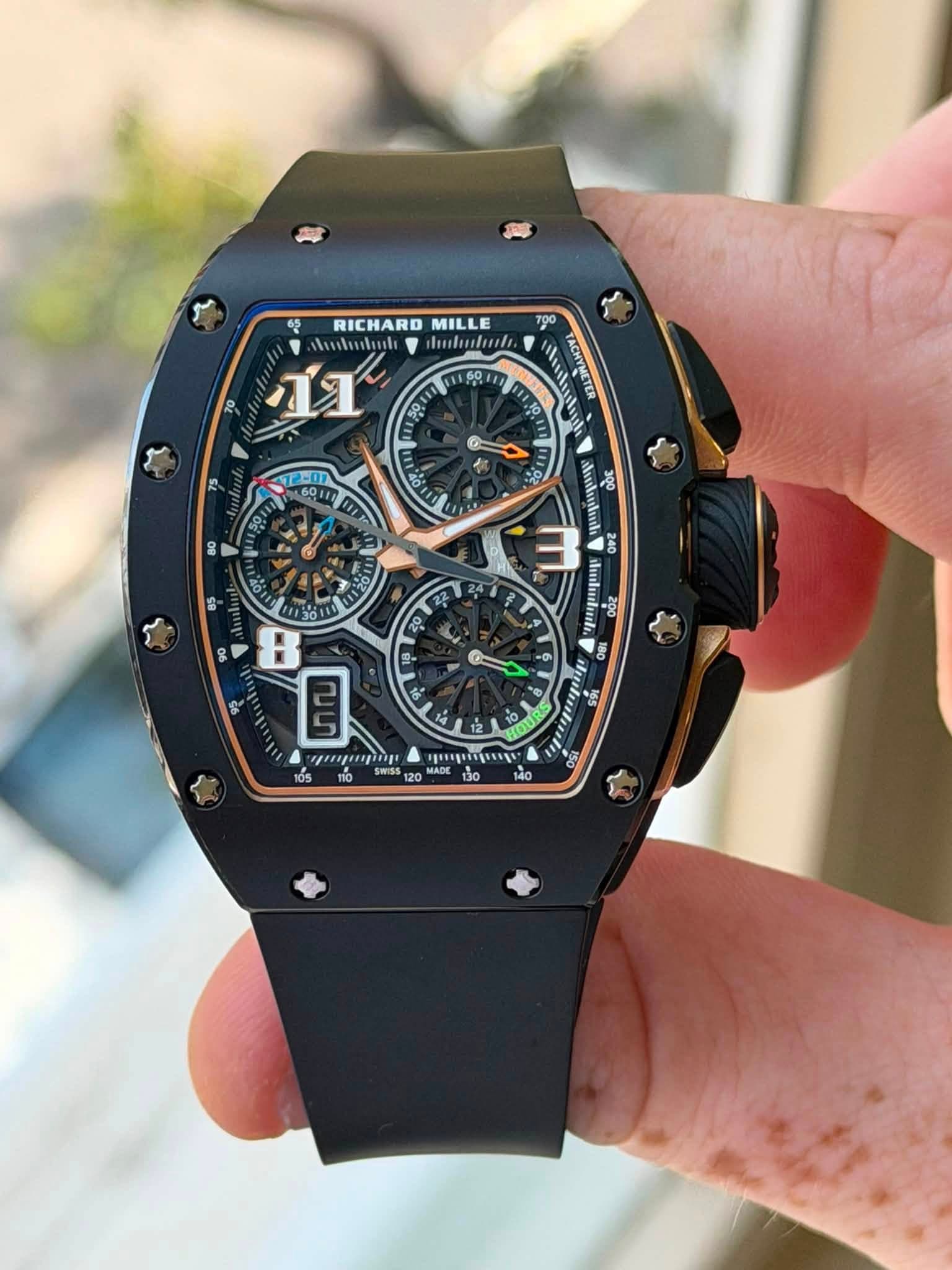 May be an image of wrist watch and text