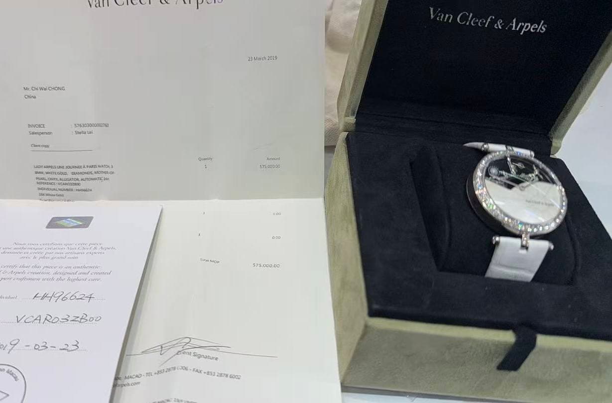 May be an image of wrist watch and text
