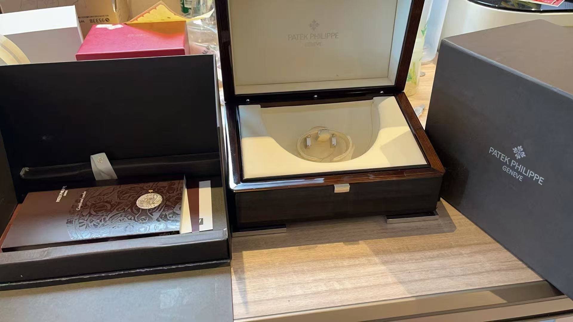 May be an image of cufflinks, wrist watch and text