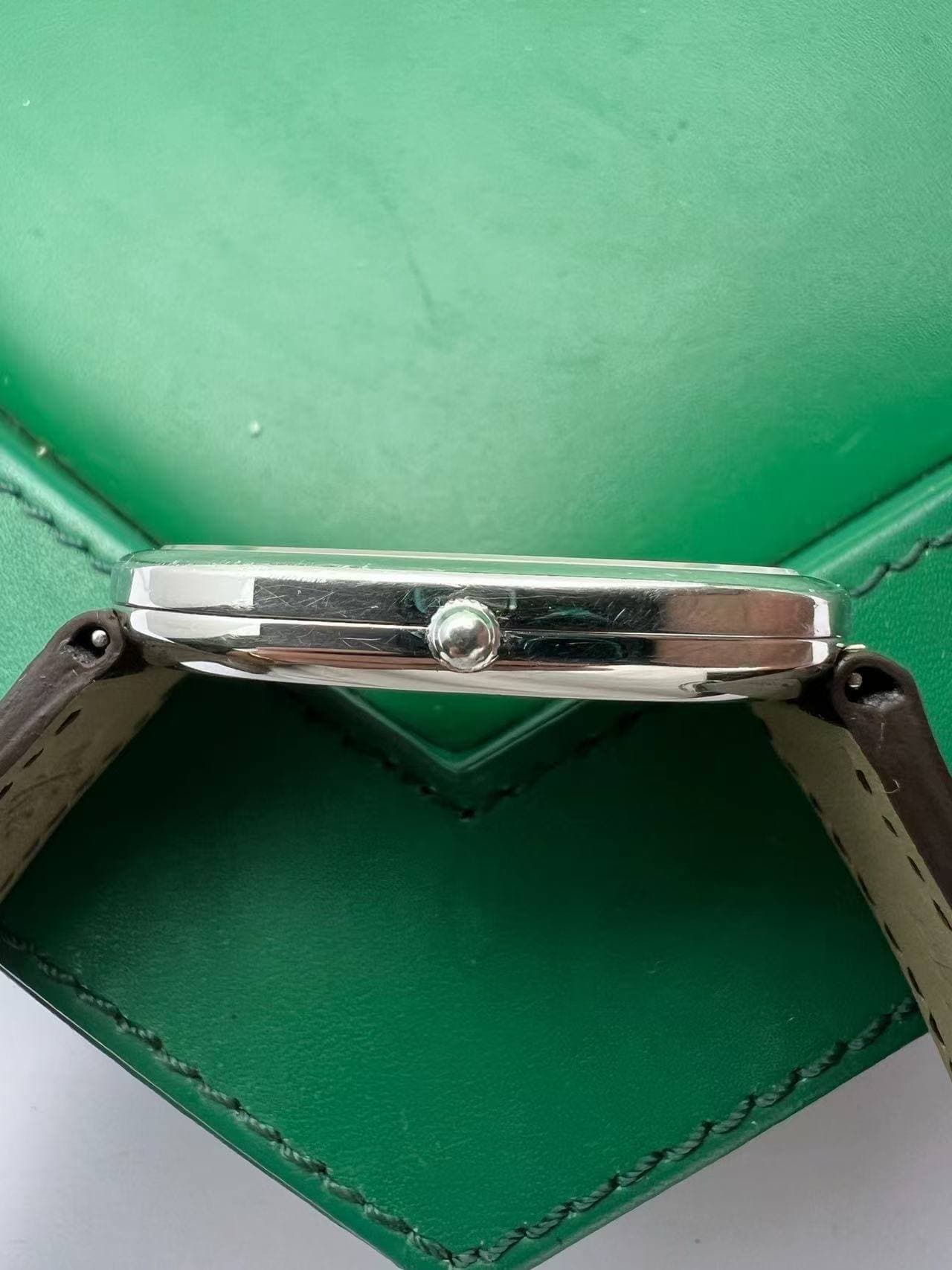 May be an image of ring and saddle-stitched leather