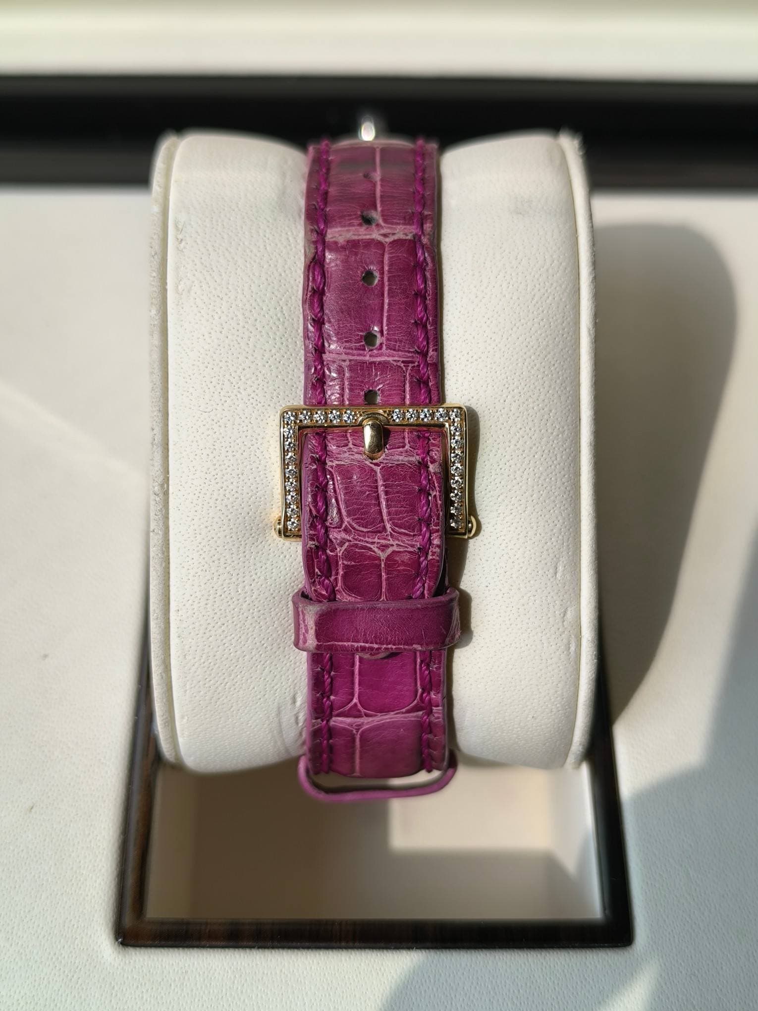May be an image of wrist watch