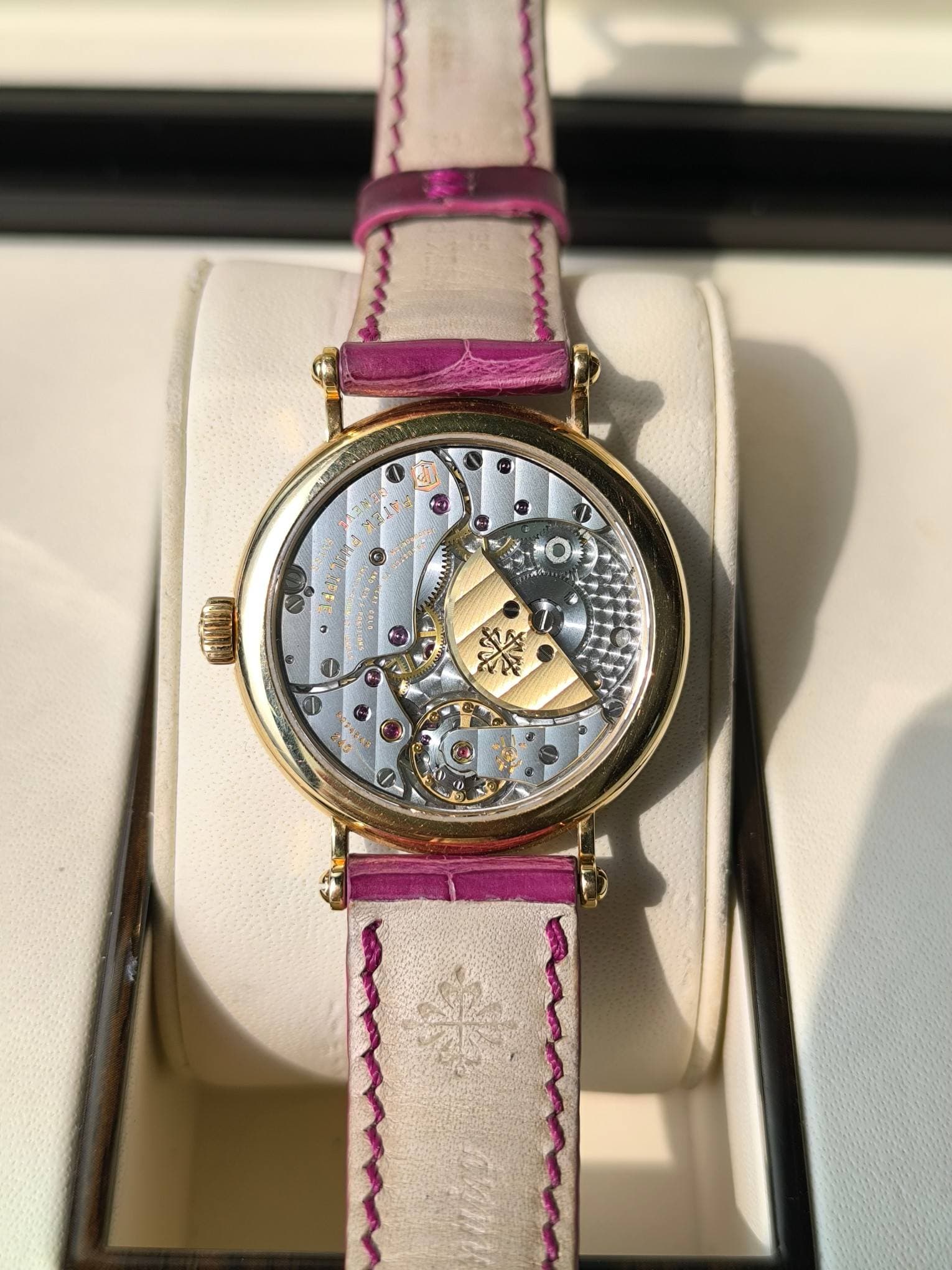 May be an image of wrist watch and text