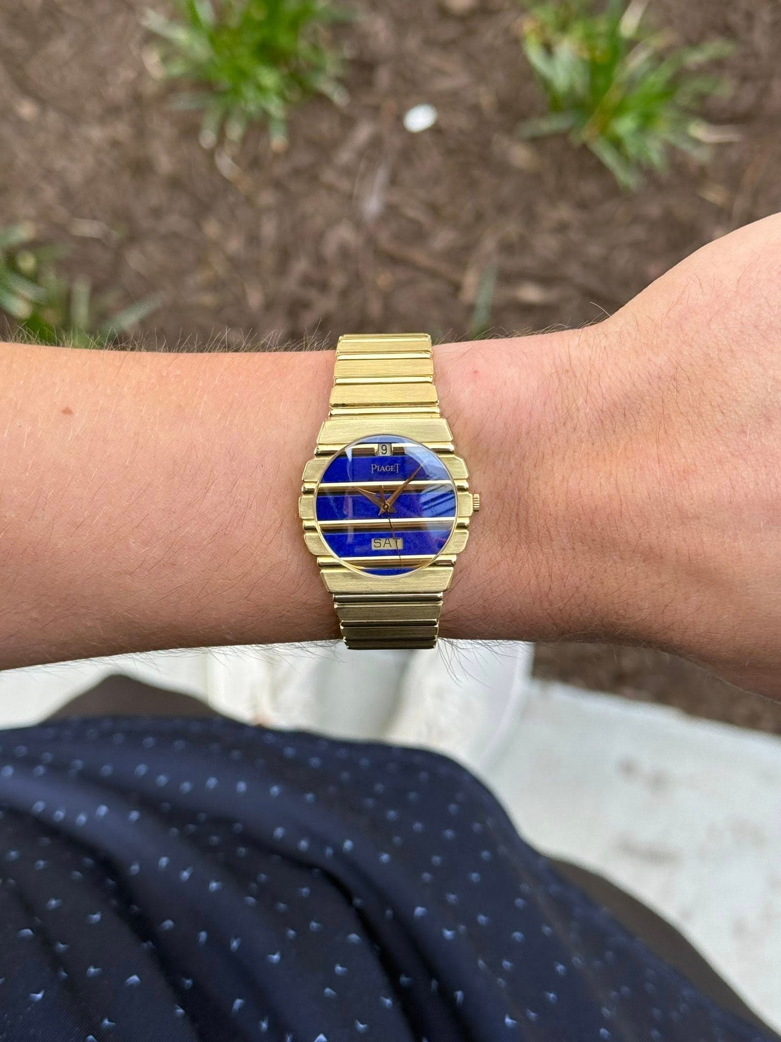 May be an image of digital watch and text