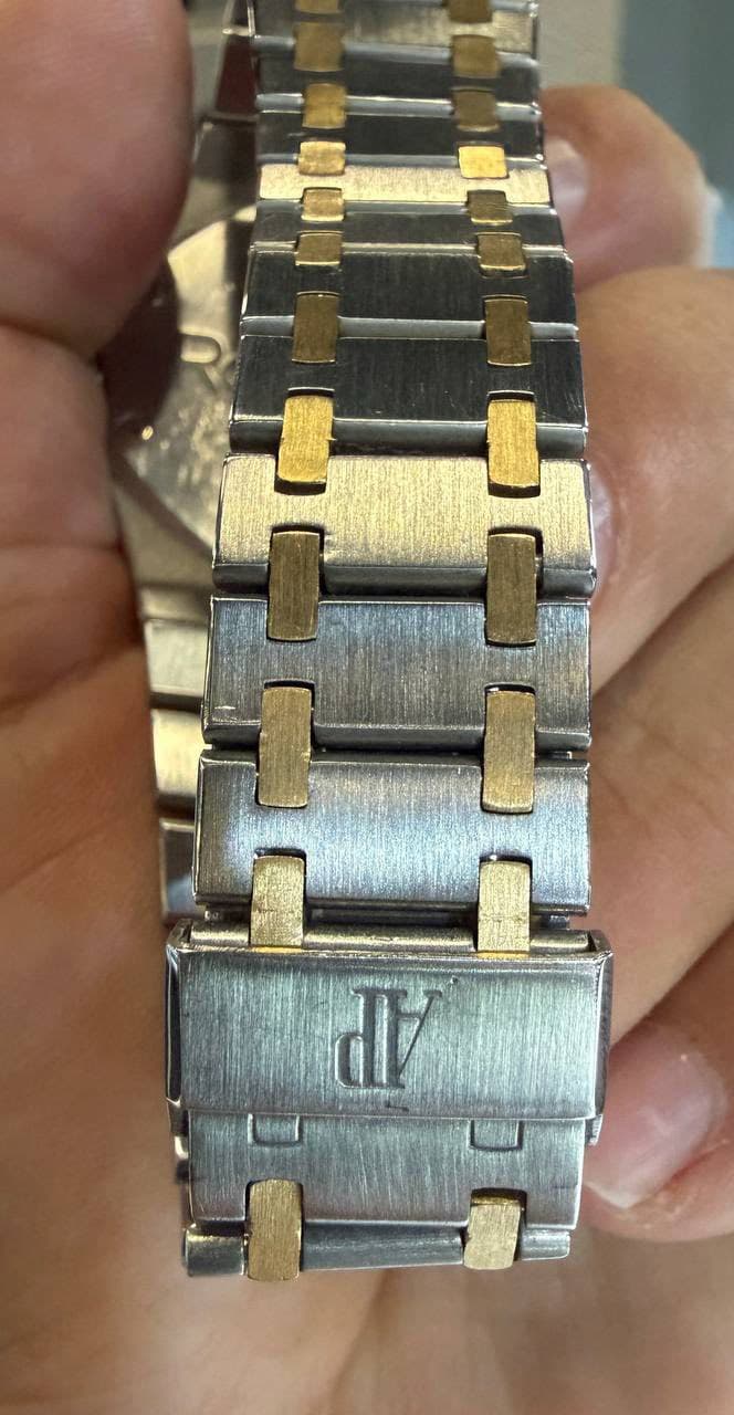 May be an image of digital watch and text