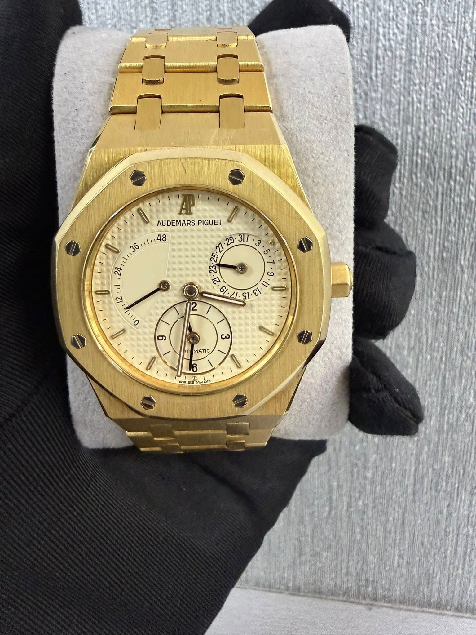 May be an image of wrist watch and text