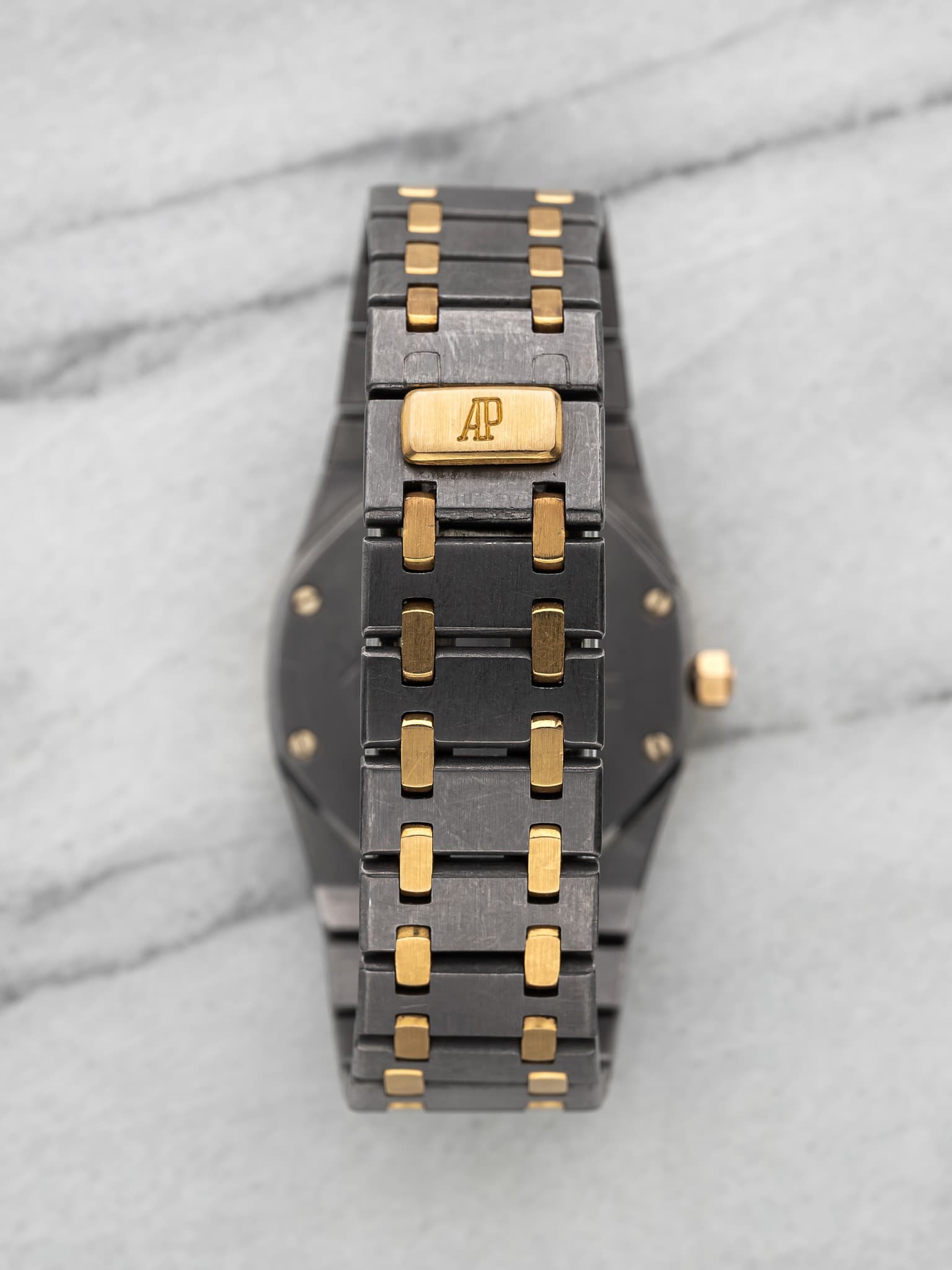 May be an image of wrist watch and text that says 'AP -'