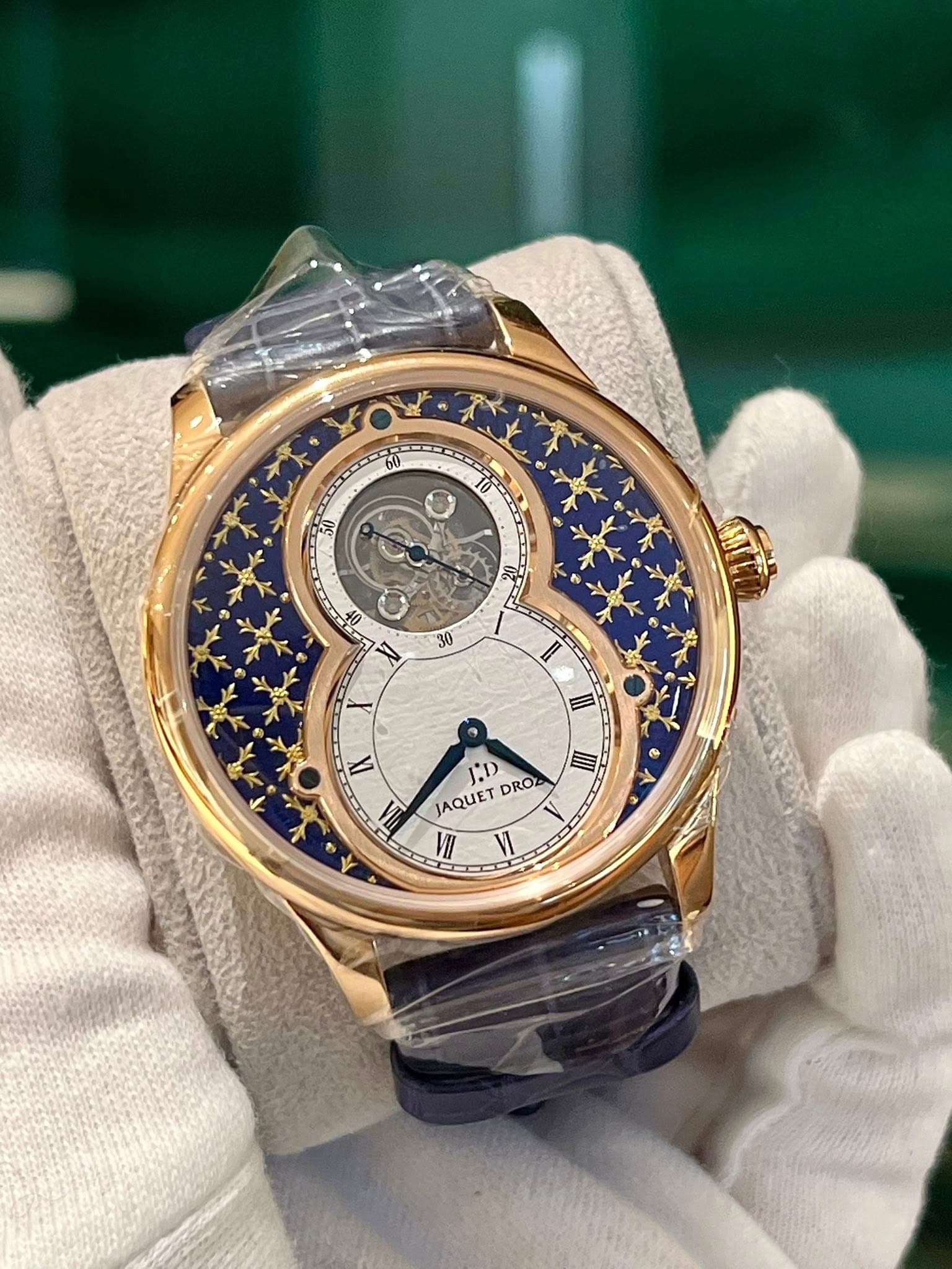 May be an image of wrist watch and text that says '50 30 ۱ II A III 1 III JAQUET J.D DROZ II'