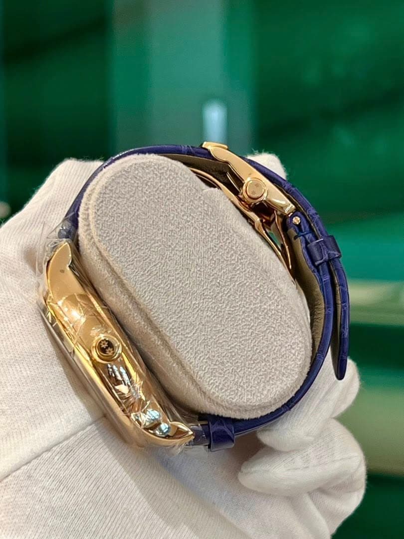 May be an image of wrist watch and ring