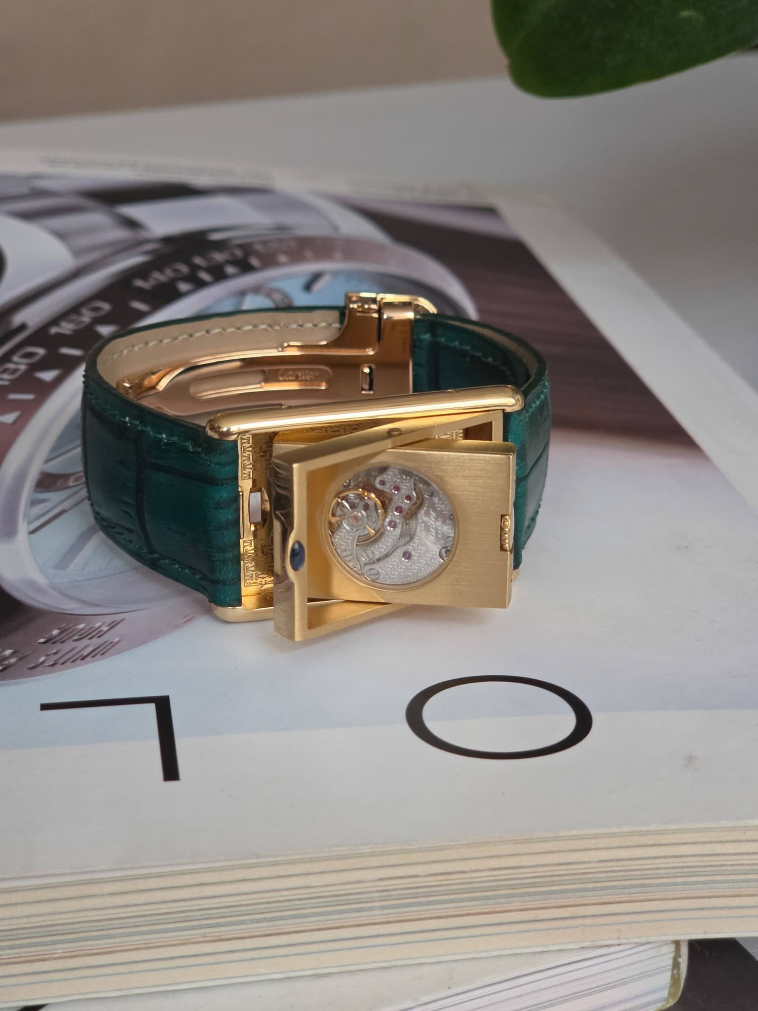 May be an image of digital watch, jewelry and text