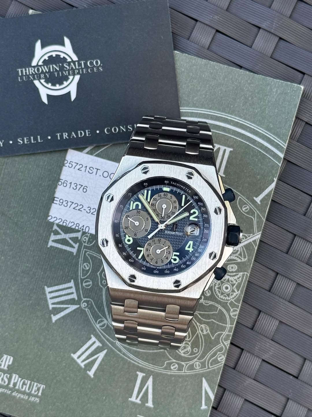May be an image of wrist watch and text