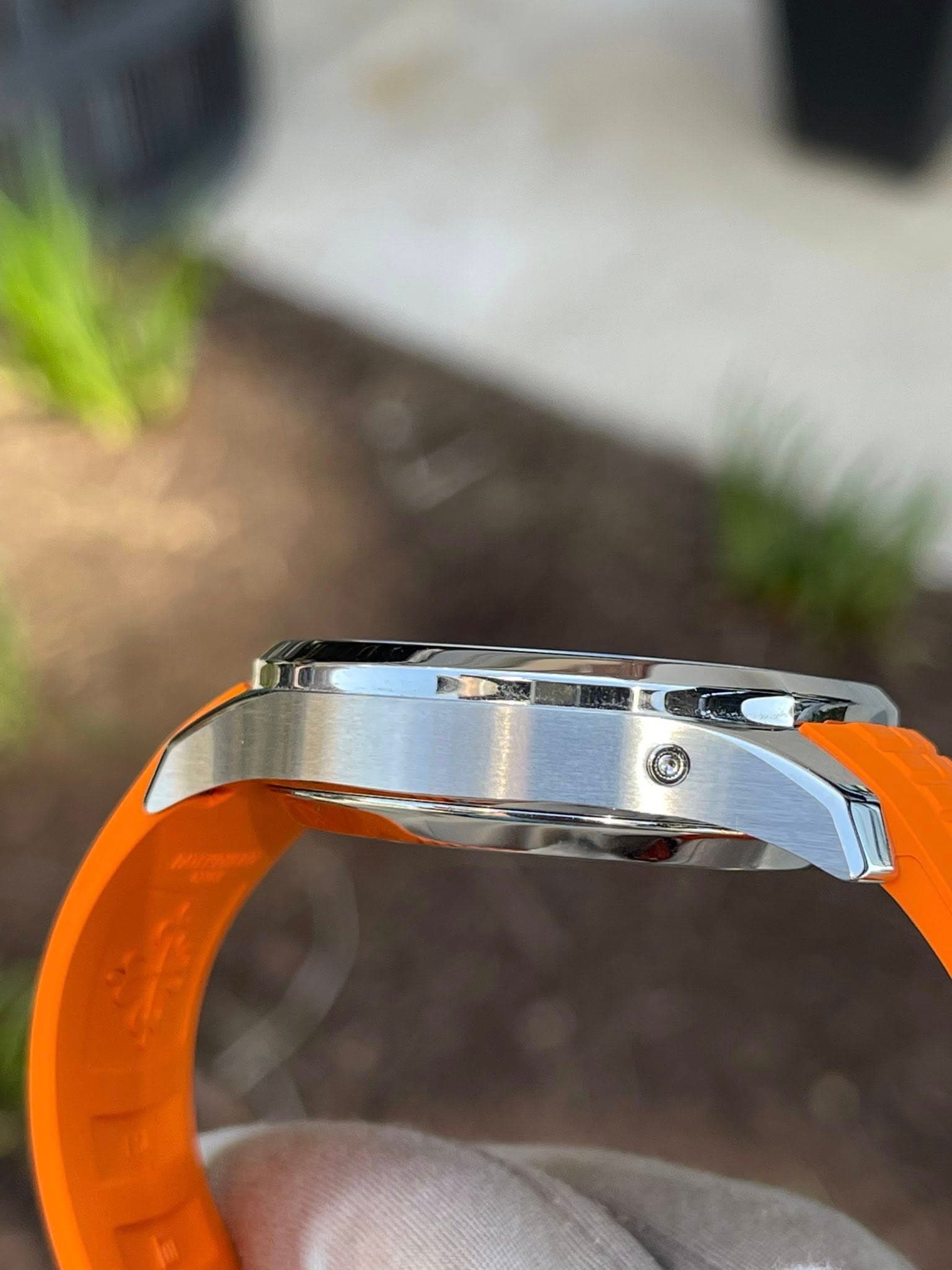 May be an image of wrist watch and text