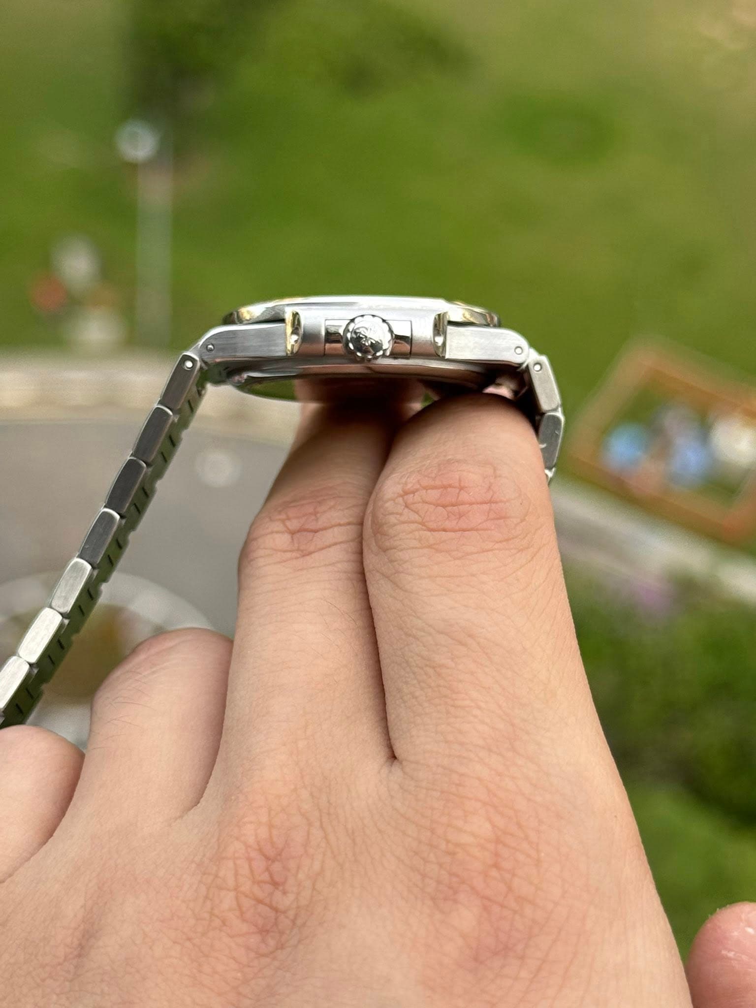 May be an image of digital watch and ring