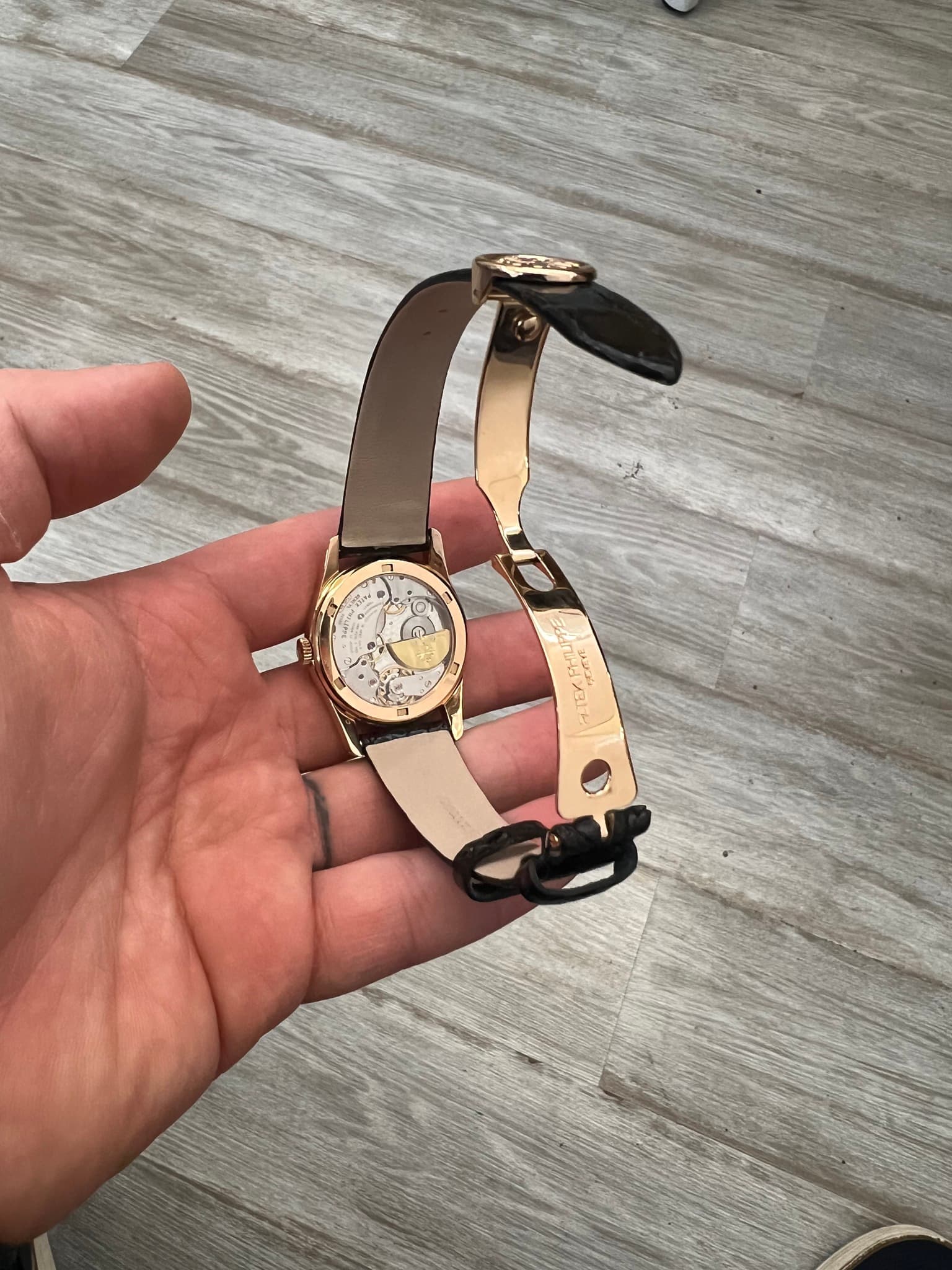 May be an image of wrist watch