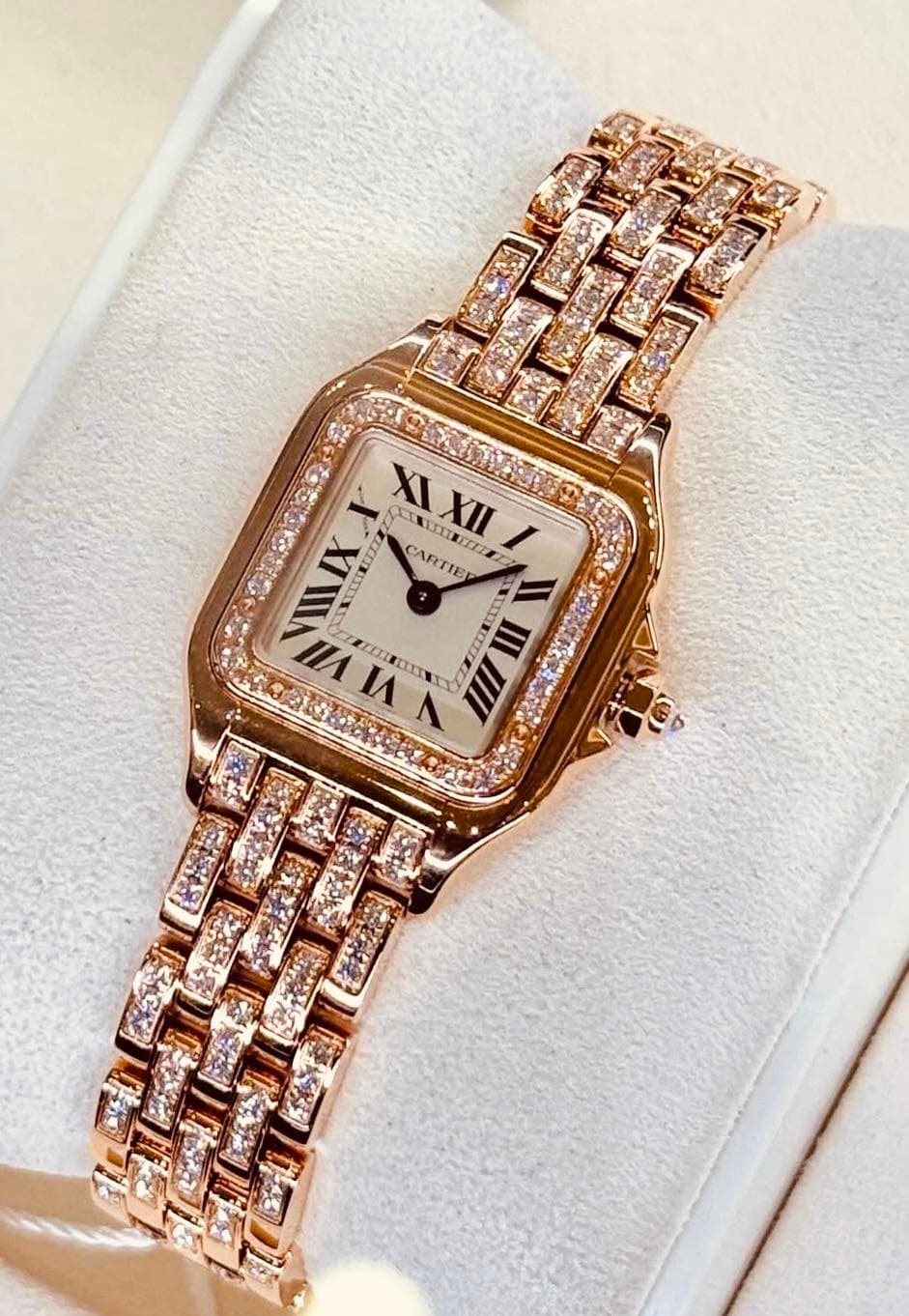 May be an image of wrist watch, jewelry and text