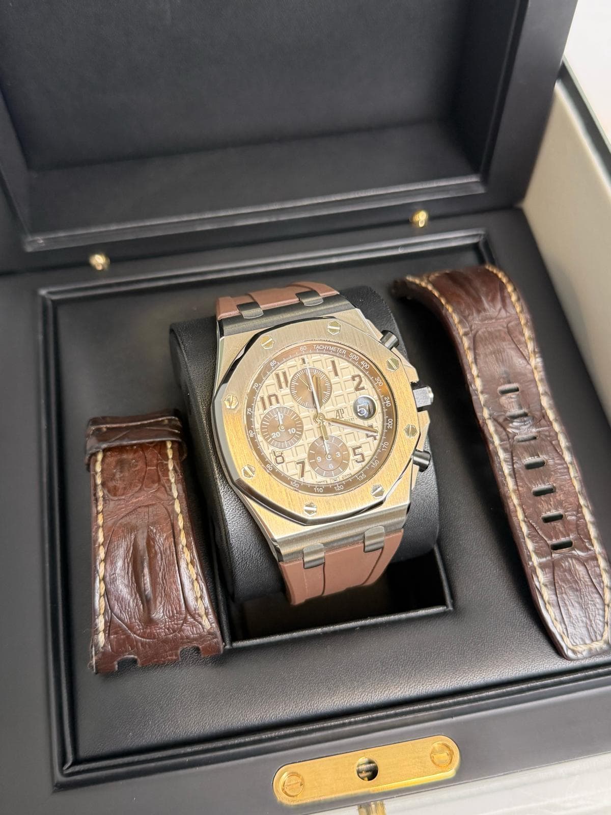 May be an image of wrist watch and text