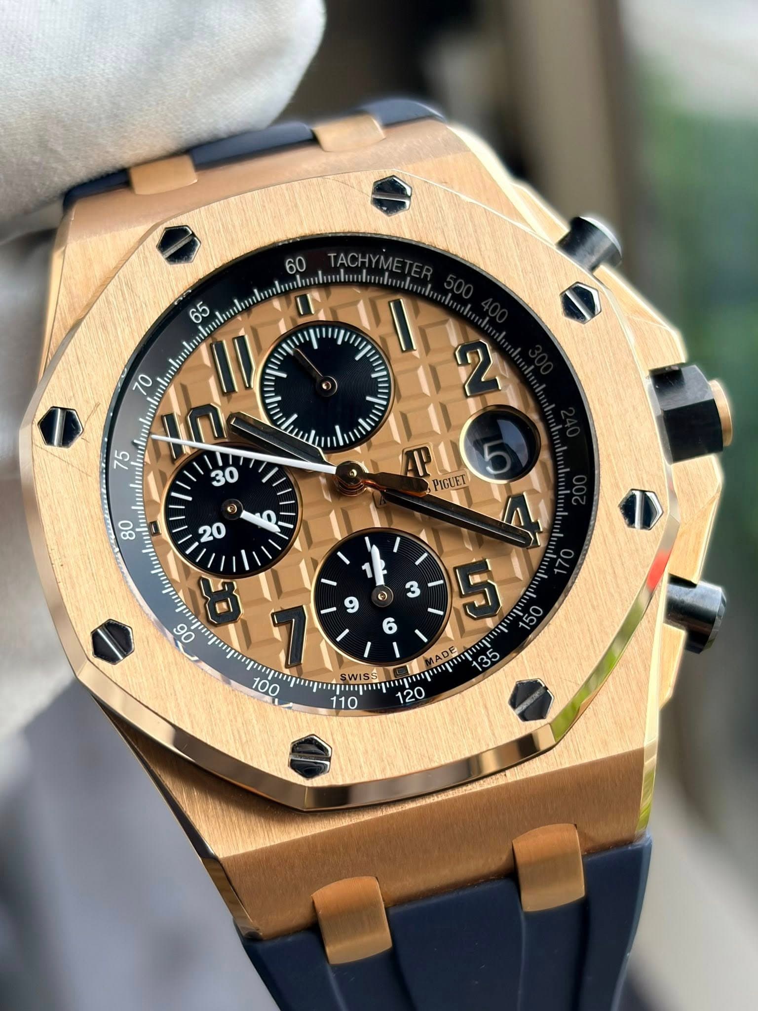 May be an image of wrist watch and text