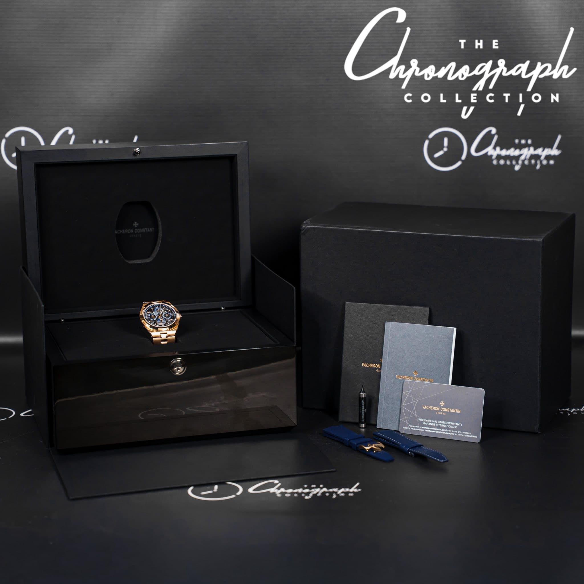 May be an image of wrist watch, cufflinks, suit and text that says 'M W H 4 N መ'