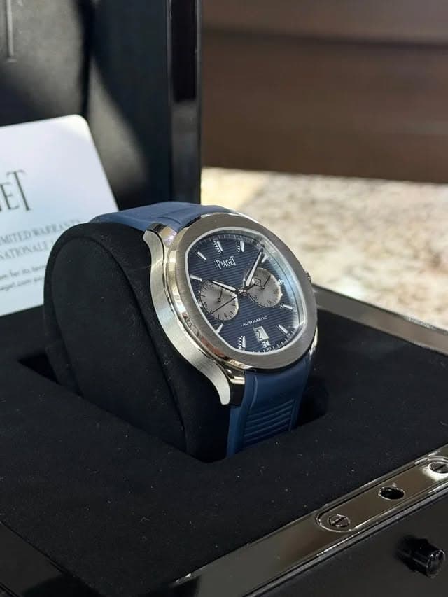 May be an image of wrist watch and text
