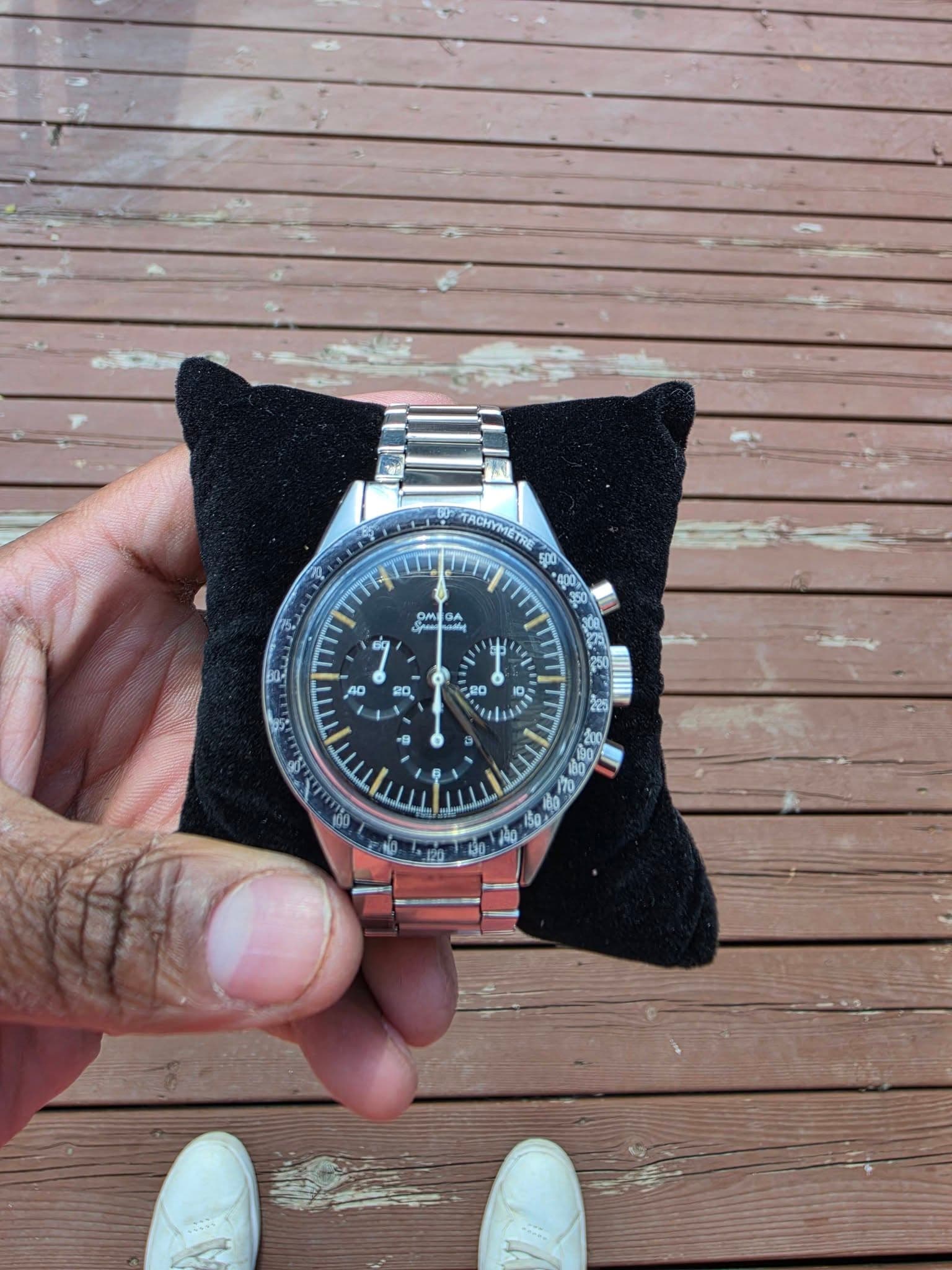 May be an image of wrist watch and text