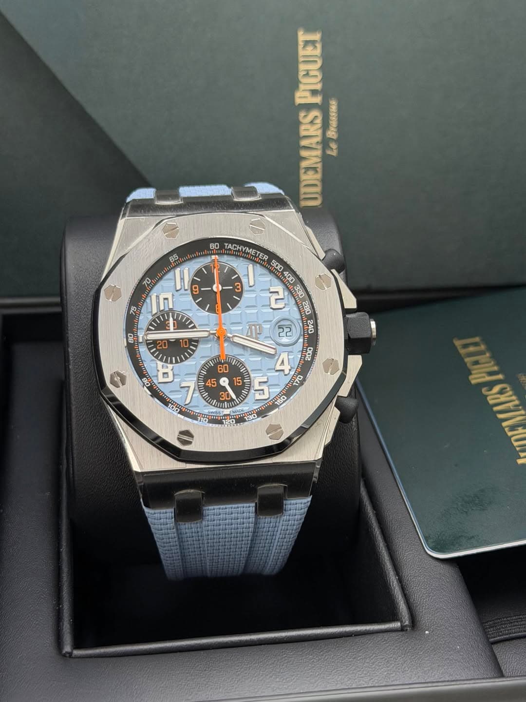 May be an image of wrist watch and text