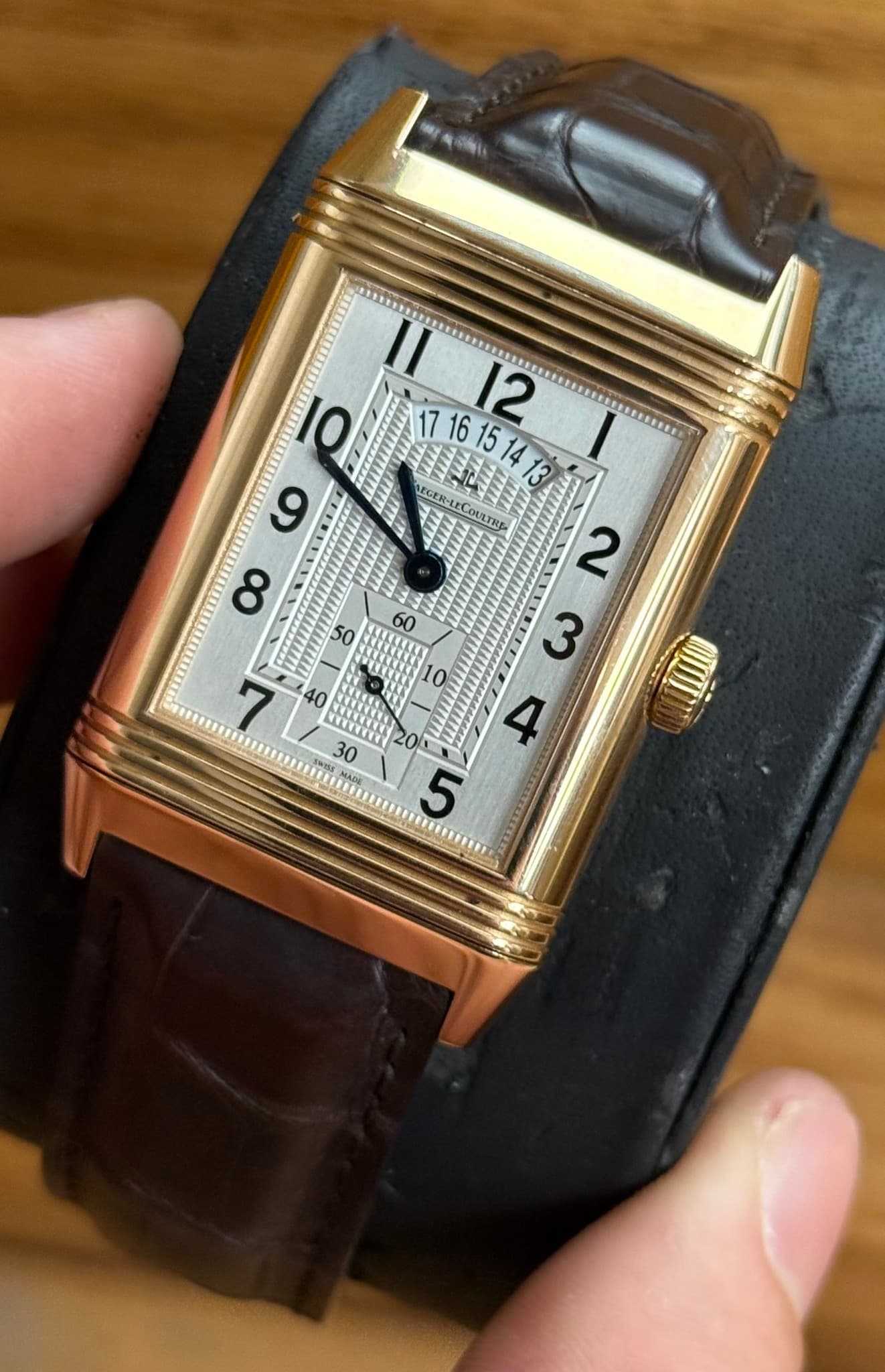 May be an image of digital watch and text