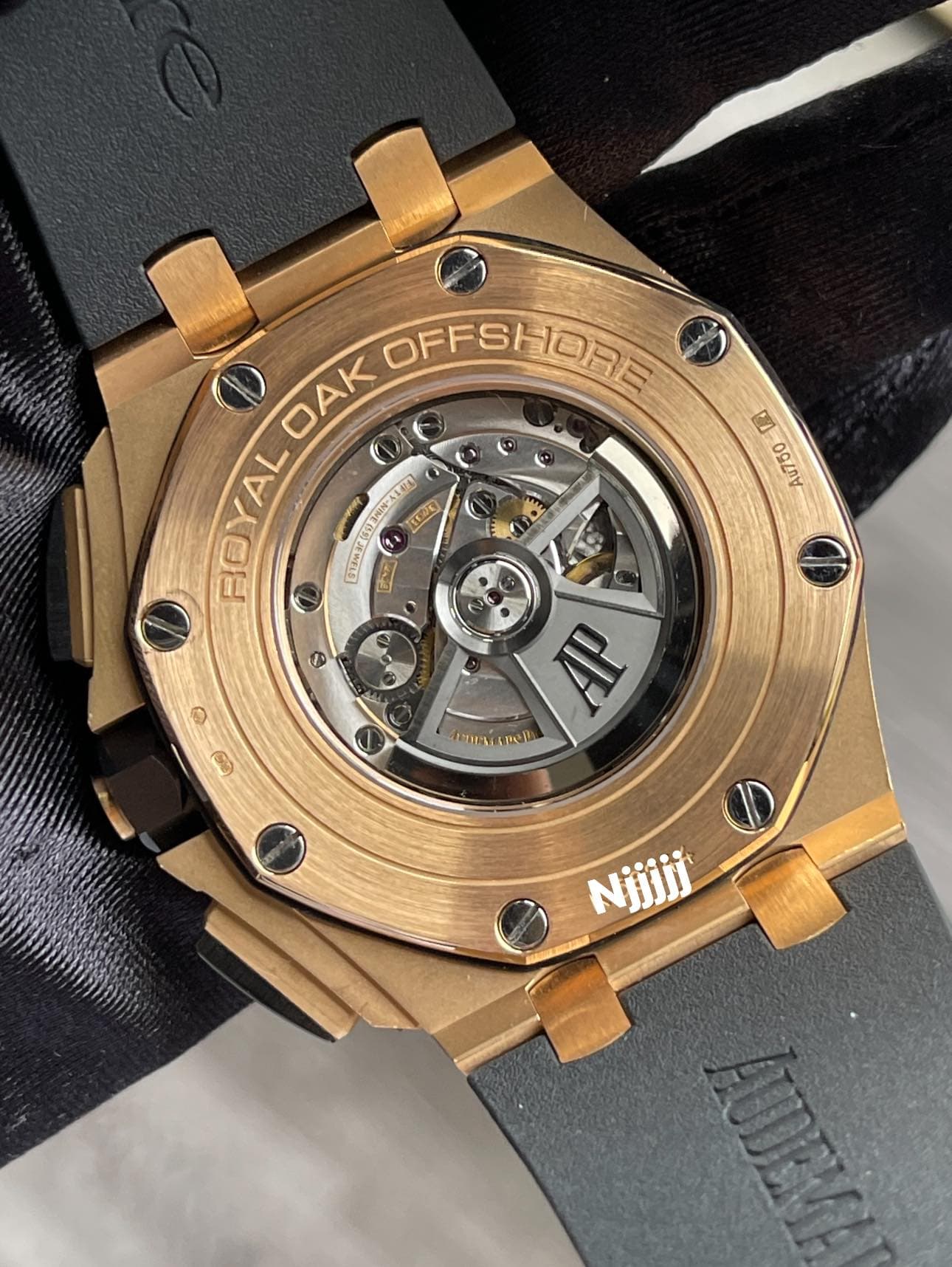 May be an image of wrist watch and text