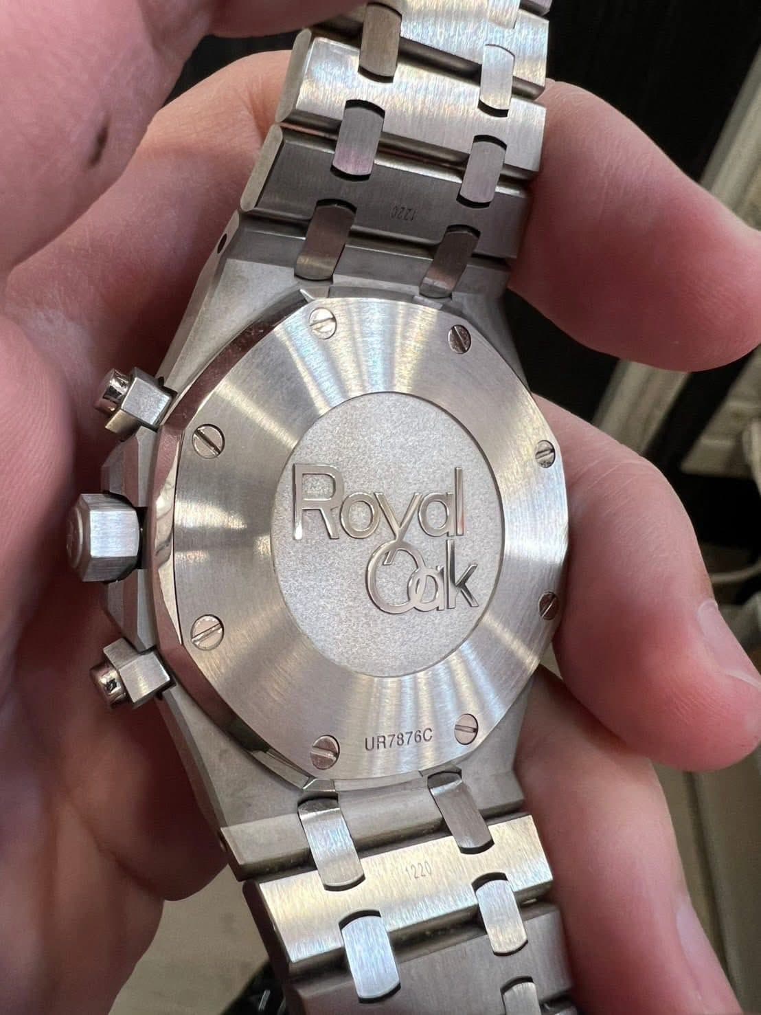 May be an image of wrist watch and text that says 'Roval Cak UR7876C UR7 UR7876C'