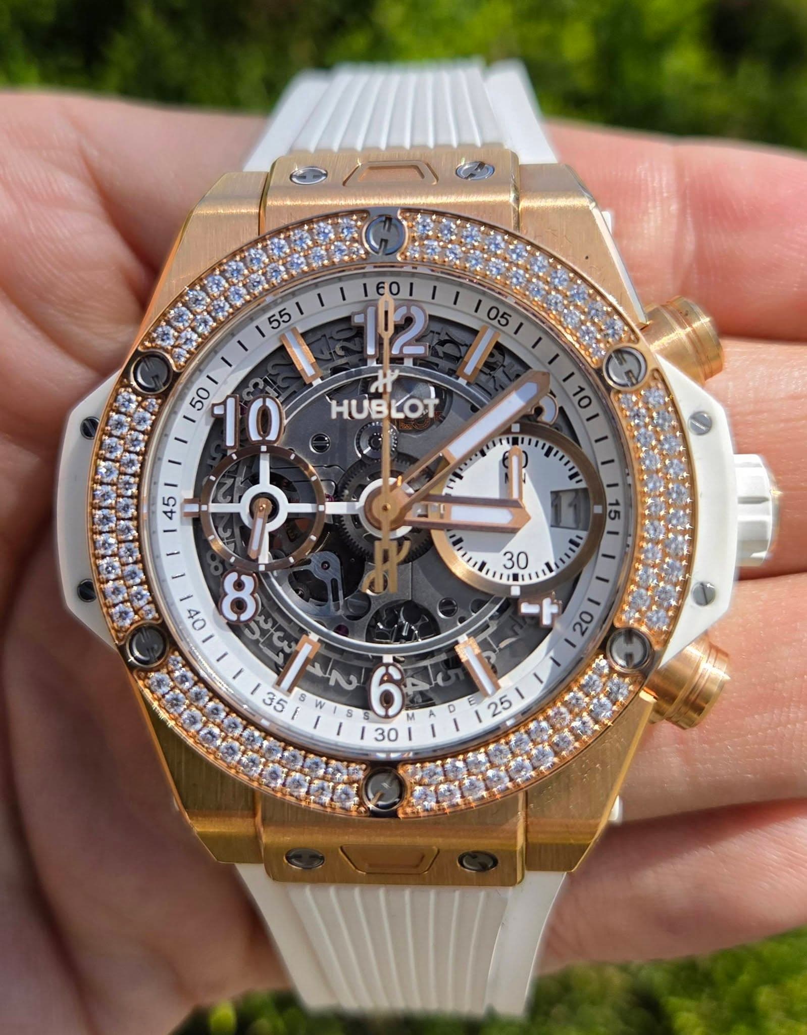 May be an image of wrist watch and text
