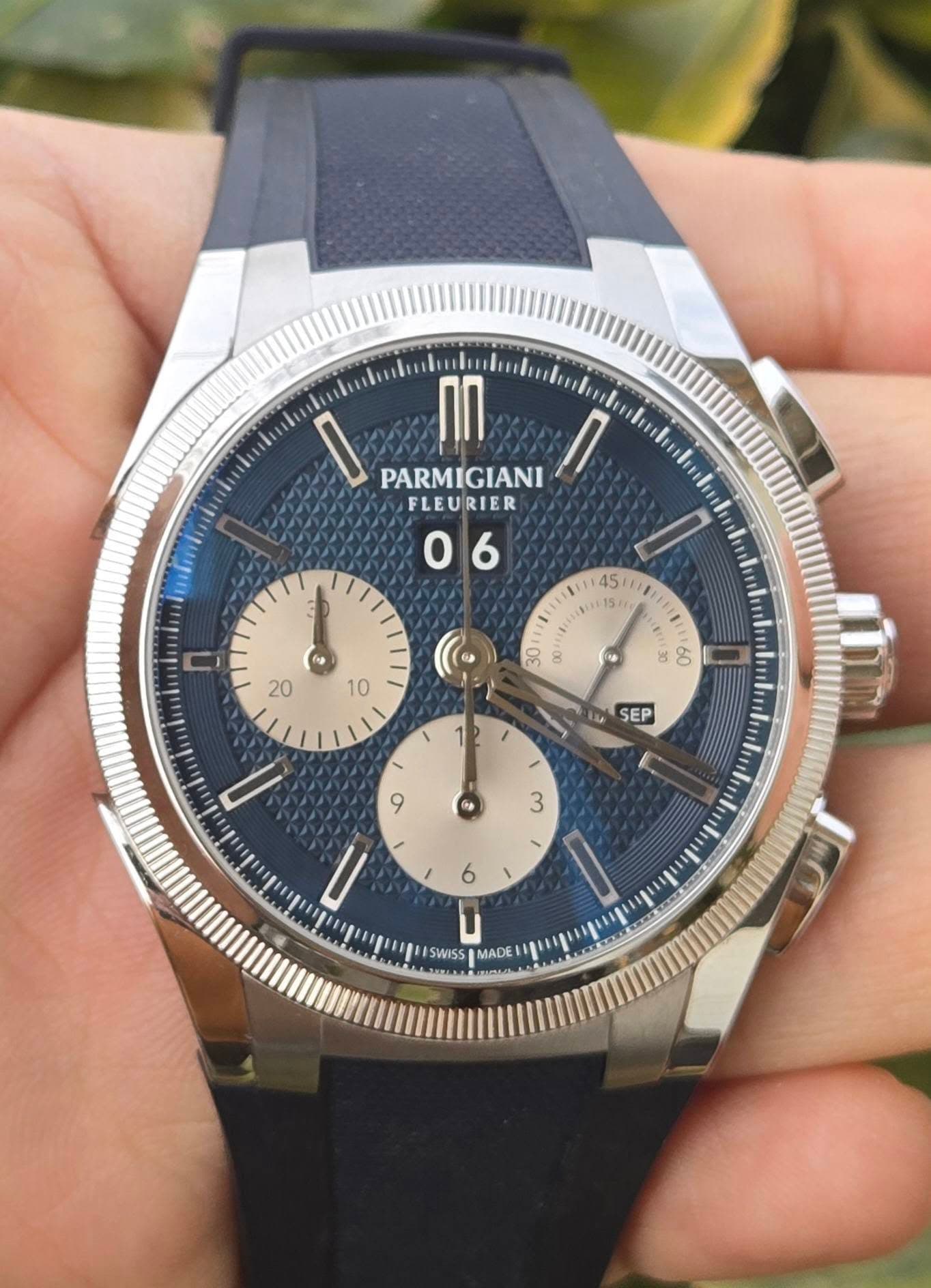 May be an image of wrist watch and text that says 'PARMIGIANI FLEURIER 06 O 45 BI0TEA G f 10 20 60 แม SEP 9 株 3 ١ 6 UII = SWISS MADE M'