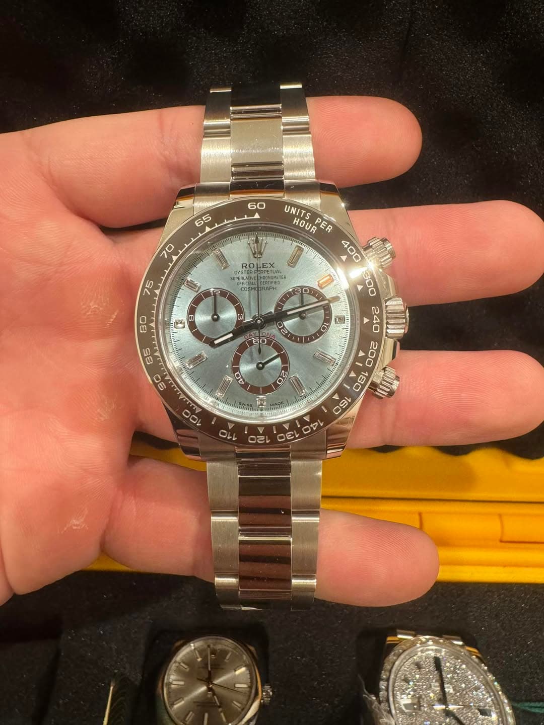 May be an image of wrist watch and text
