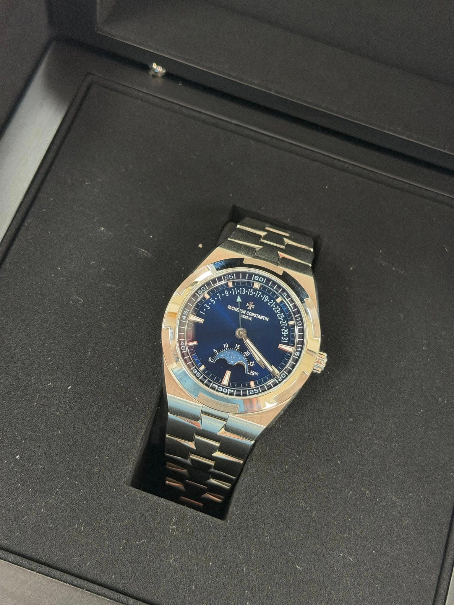 May be an image of wrist watch and text