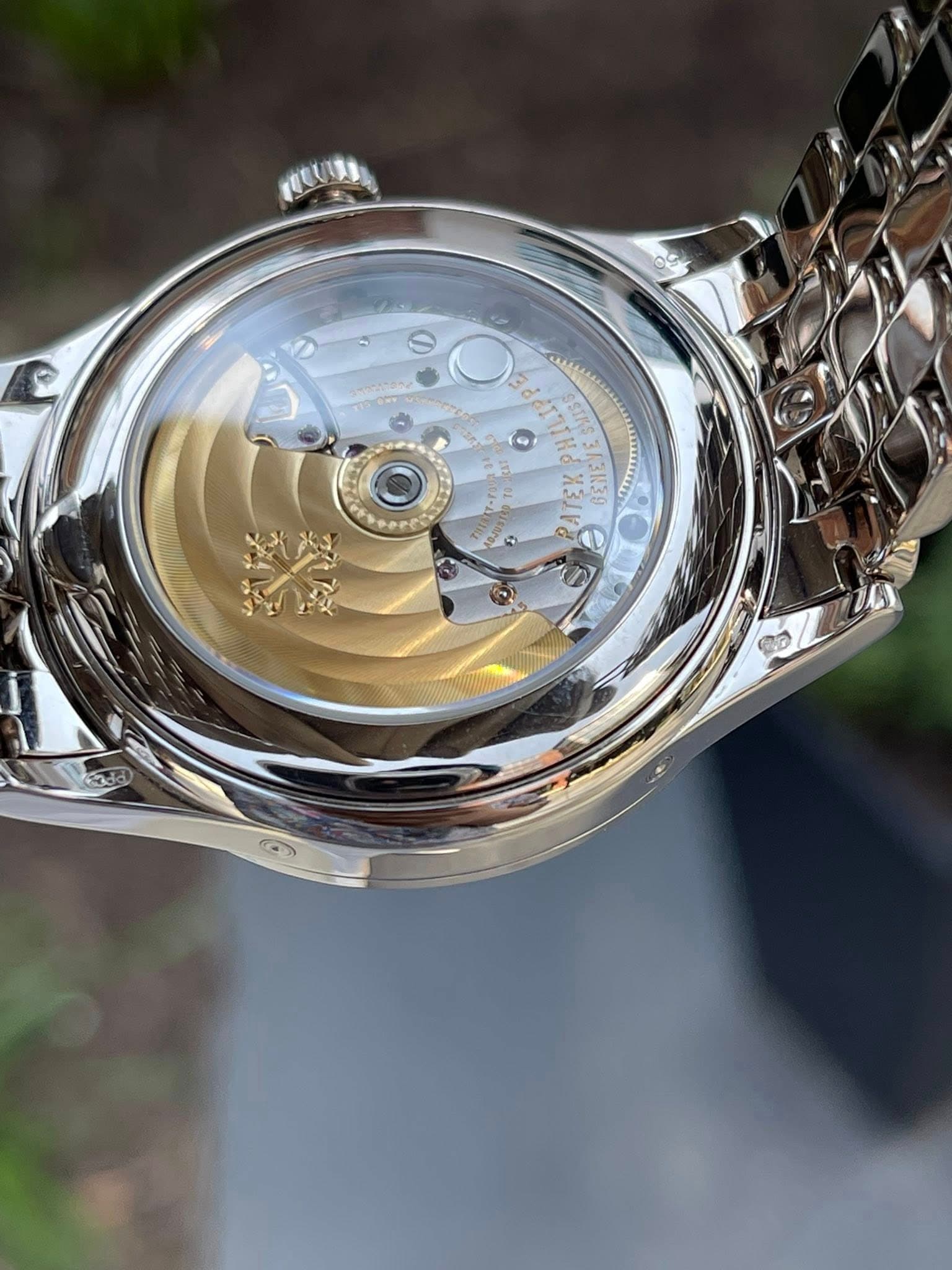 May be an image of wrist watch and text