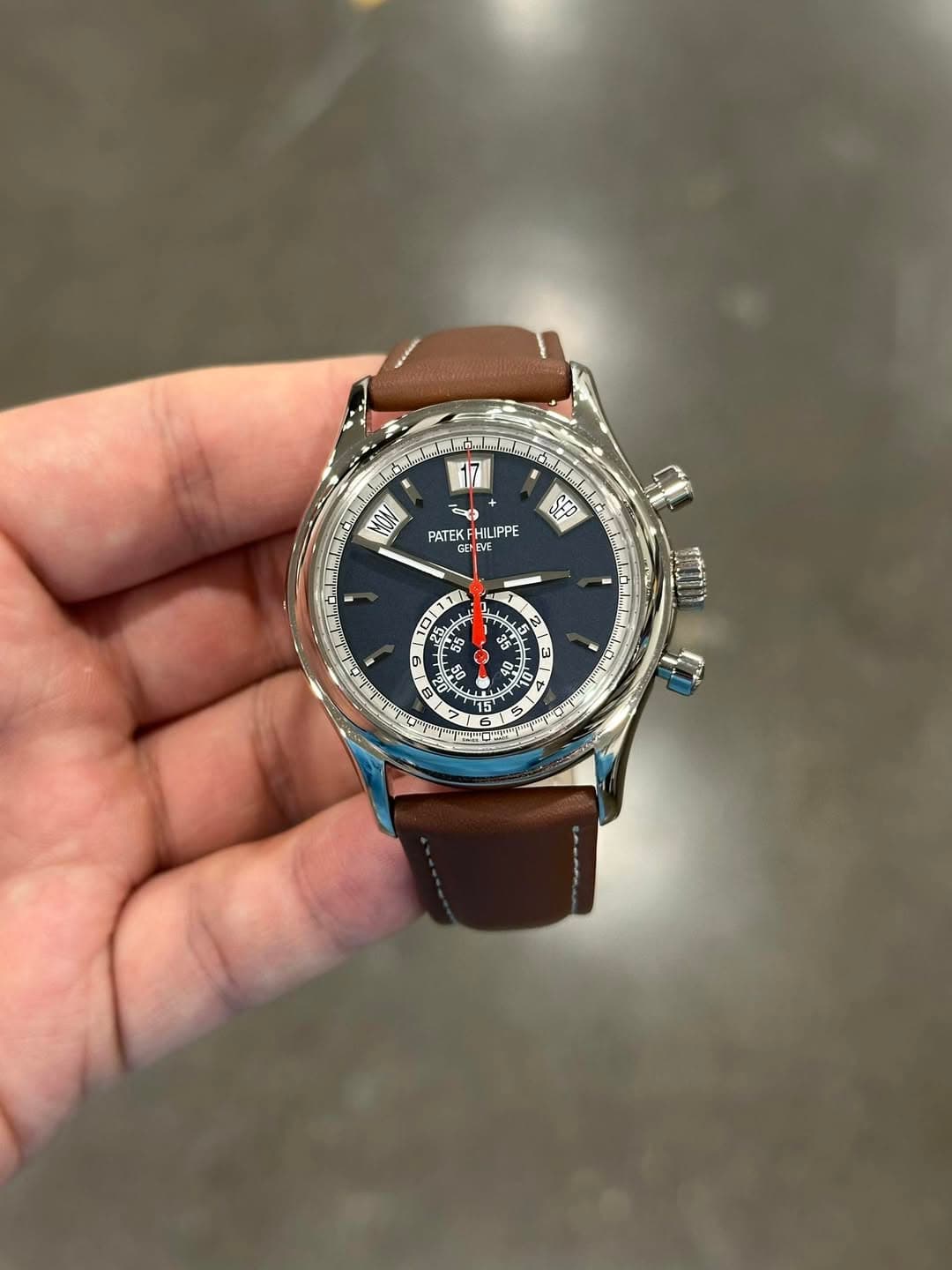 May be an image of wrist watch and text