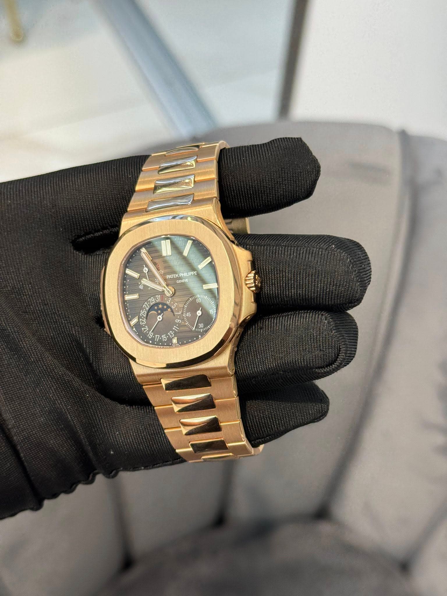 May be an image of wrist watch and text