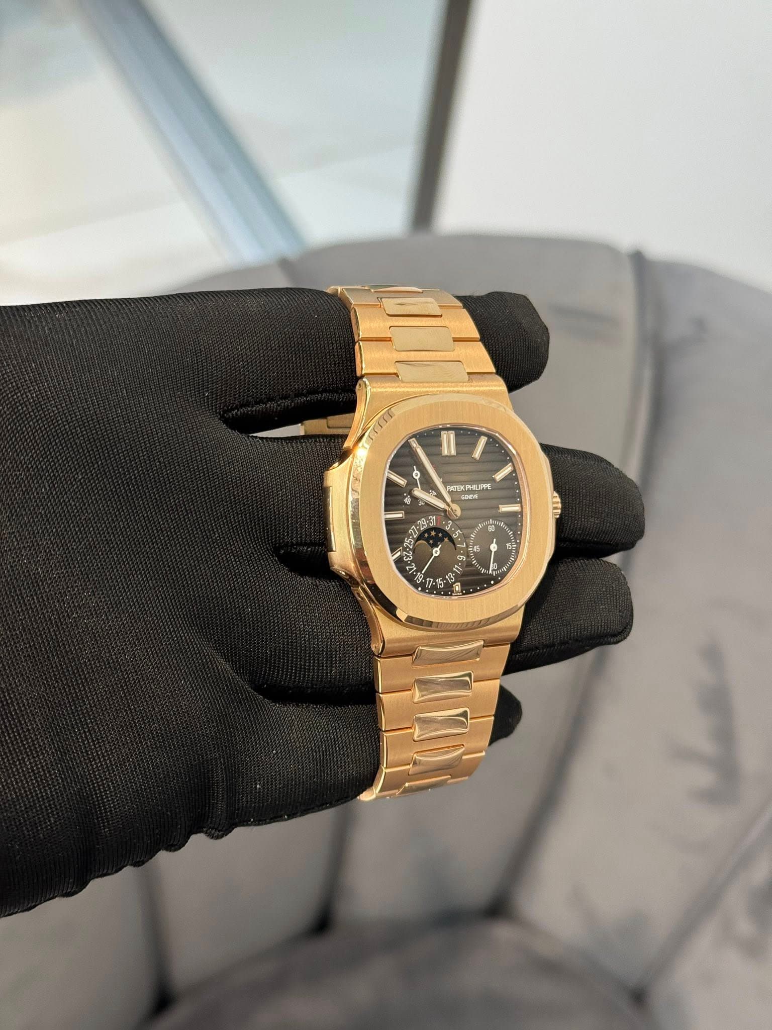 May be an image of wrist watch and text